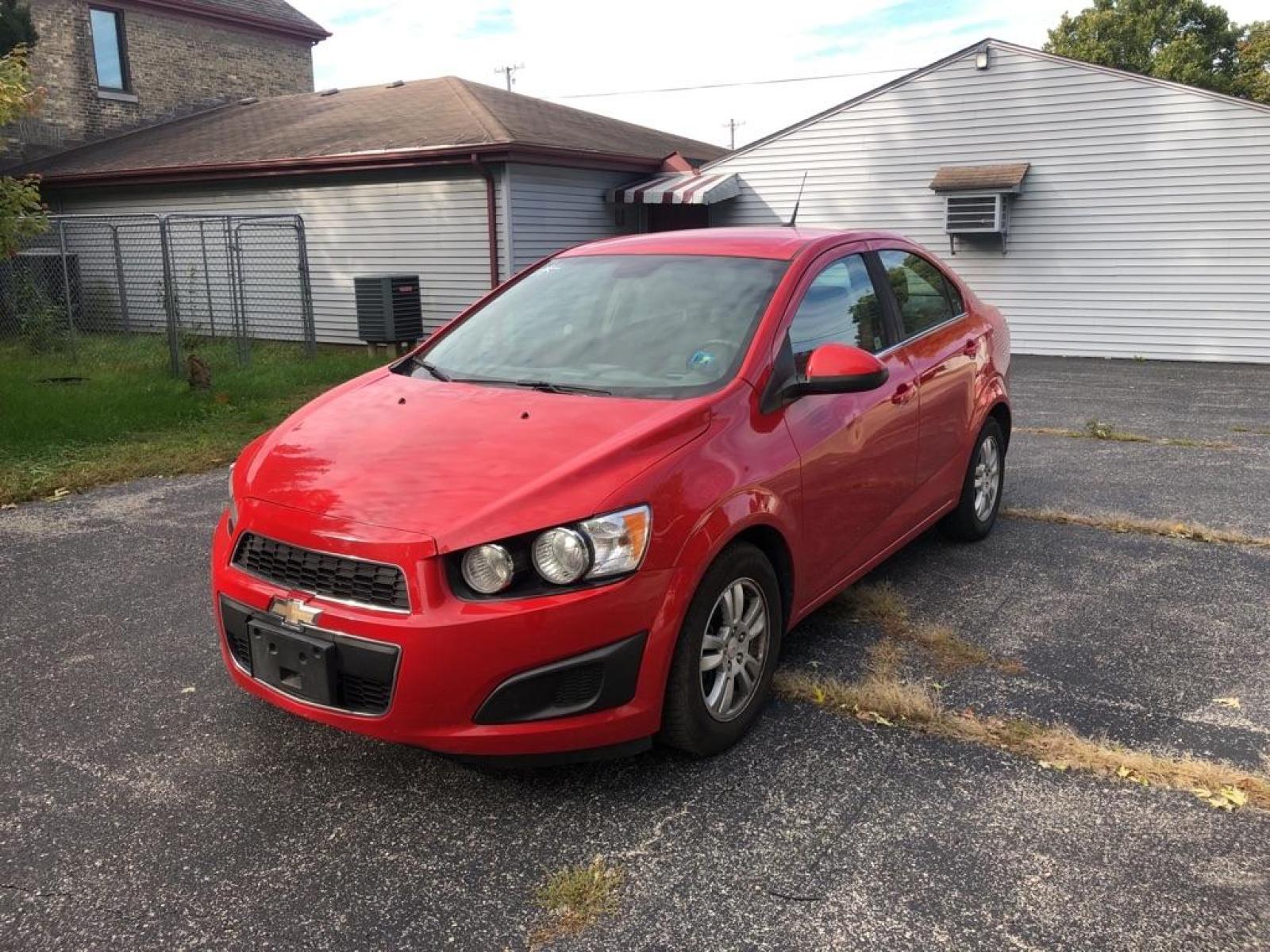 2012 RED CHEVROLET SONIC LT (1G1JC5SH3C4) with an 1.8L engine, Automatic transmission, located at 1708 Broadway, Rockford, IL, 61104, (815) 397-5010, 42.252522, -89.069359 - Photo #0