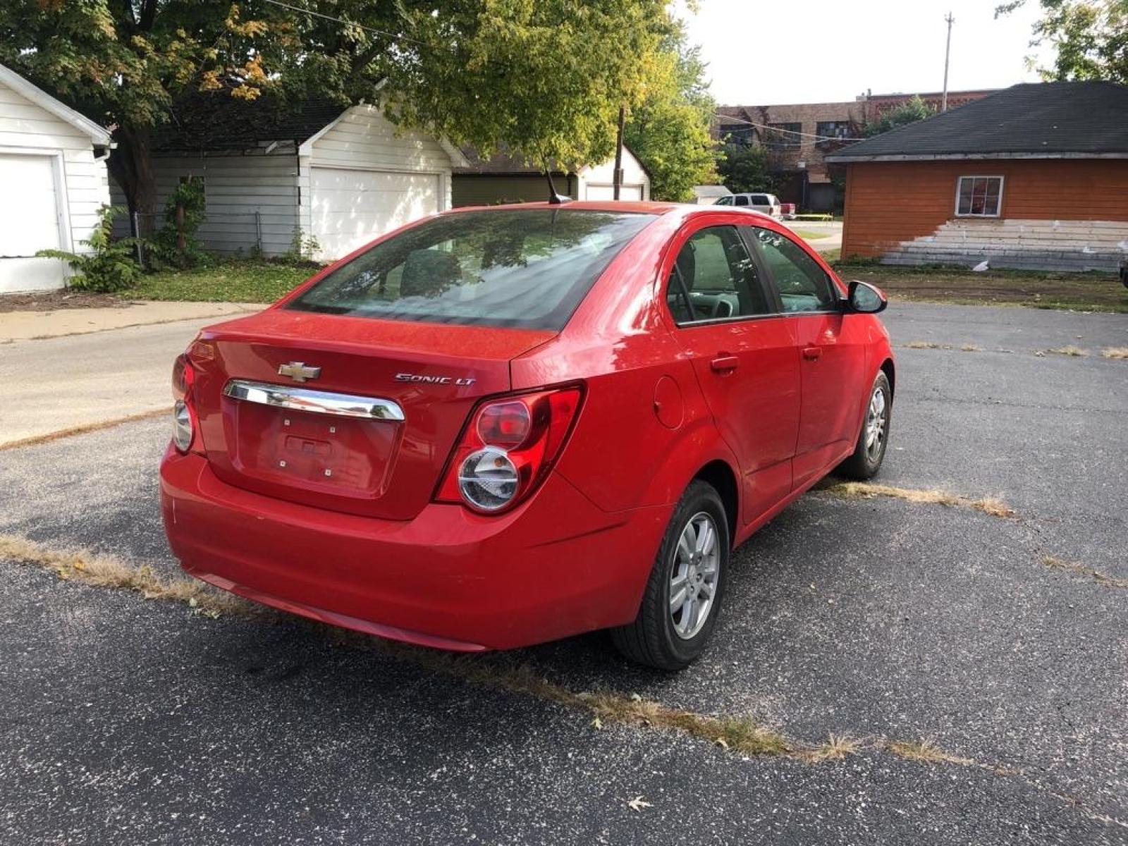 2012 RED CHEVROLET SONIC LT (1G1JC5SH3C4) with an 1.8L engine, Automatic transmission, located at 1708 Broadway, Rockford, IL, 61104, (815) 397-5010, 42.252522, -89.069359 - Photo #2