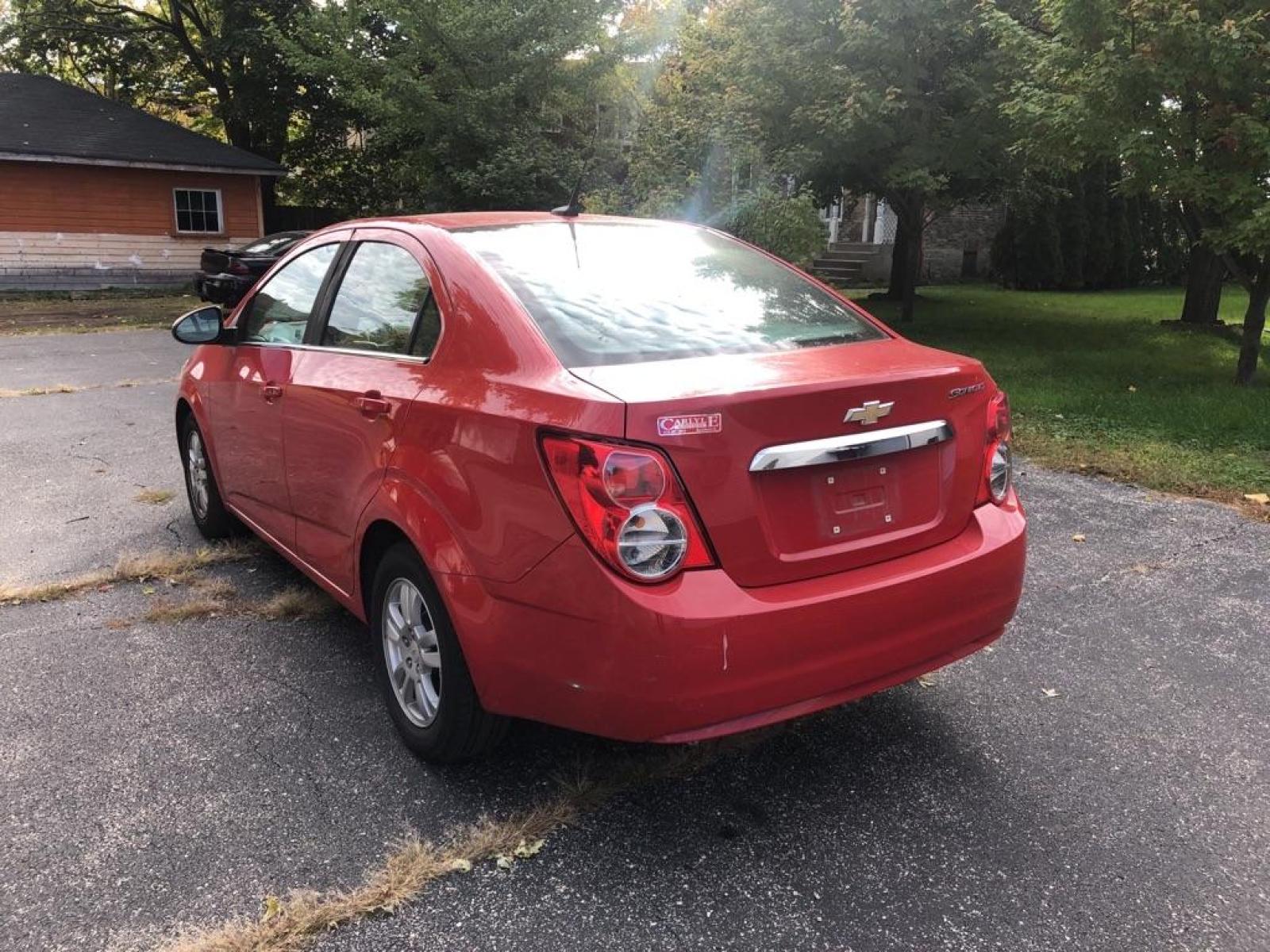 2012 RED CHEVROLET SONIC LT (1G1JC5SH3C4) with an 1.8L engine, Automatic transmission, located at 1708 Broadway, Rockford, IL, 61104, (815) 397-5010, 42.252522, -89.069359 - Photo #3