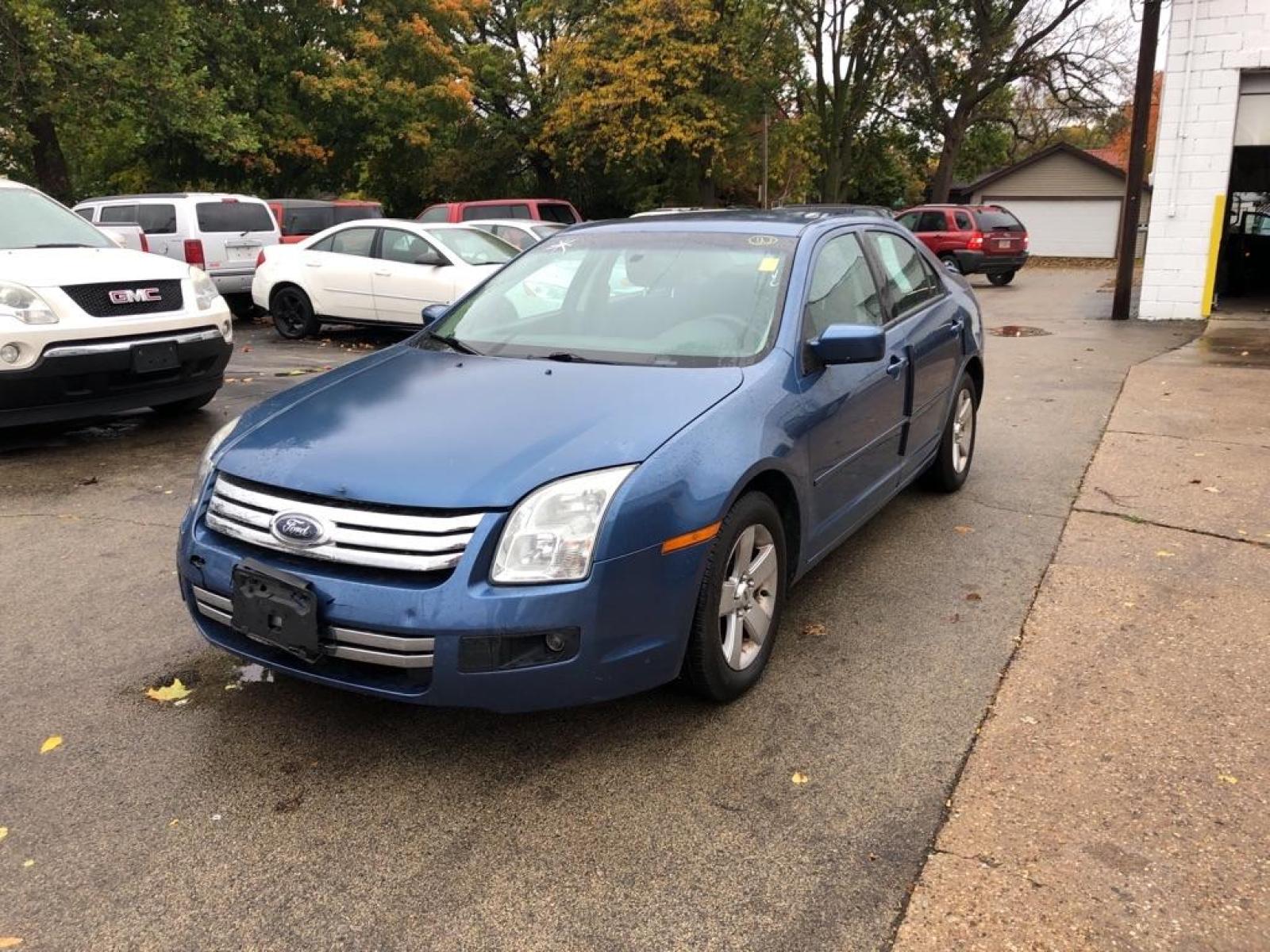 2009 BLUE FORD FUSION SE (3FAHP07129R) with an 3.0L engine, Automatic transmission, located at 151 Alpine Road, Rockford, IL, 61108, (815) 398-5010, 42.212986, -89.029320 - Photo #0