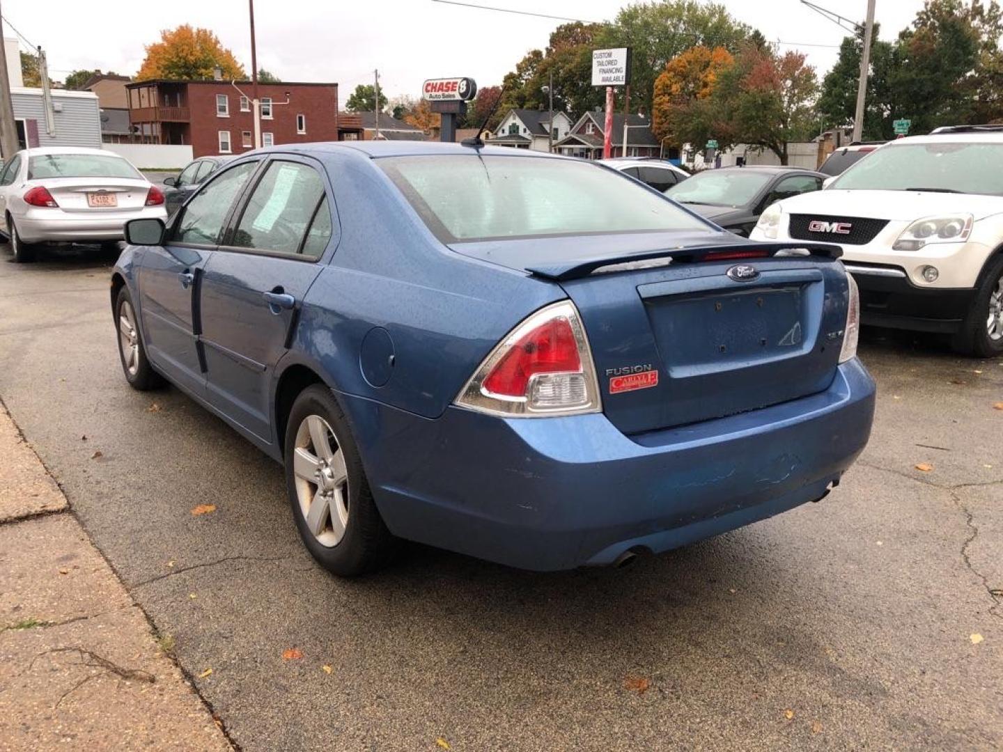 2009 BLUE FORD FUSION SE (3FAHP07129R) with an 3.0L engine, Automatic transmission, located at 1708 Broadway, Rockford, IL, 61104, (815) 397-5010, 42.252522, -89.069359 - Photo#3