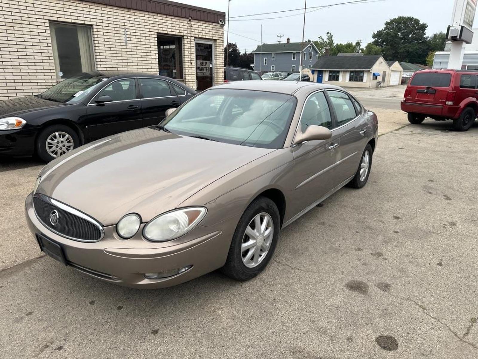 2006 GOLD BUICK LACROSSE CXL (2G4WD582561) with an 3.8L engine, Automatic transmission, located at 1708 Broadway, Rockford, IL, 61104, (815) 397-5010, 42.252522, -89.069359 - Photo #0
