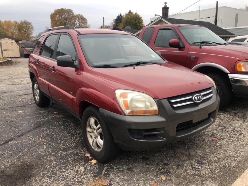 2005 RED KIA NEW SPORTAGE (KNDJE723257) with an 2.7L engine, Automatic transmission, located at 151 Alpine Road, Rockford, IL, 61108, (815) 398-5010, 42.212986, -89.029320 - Photo #1