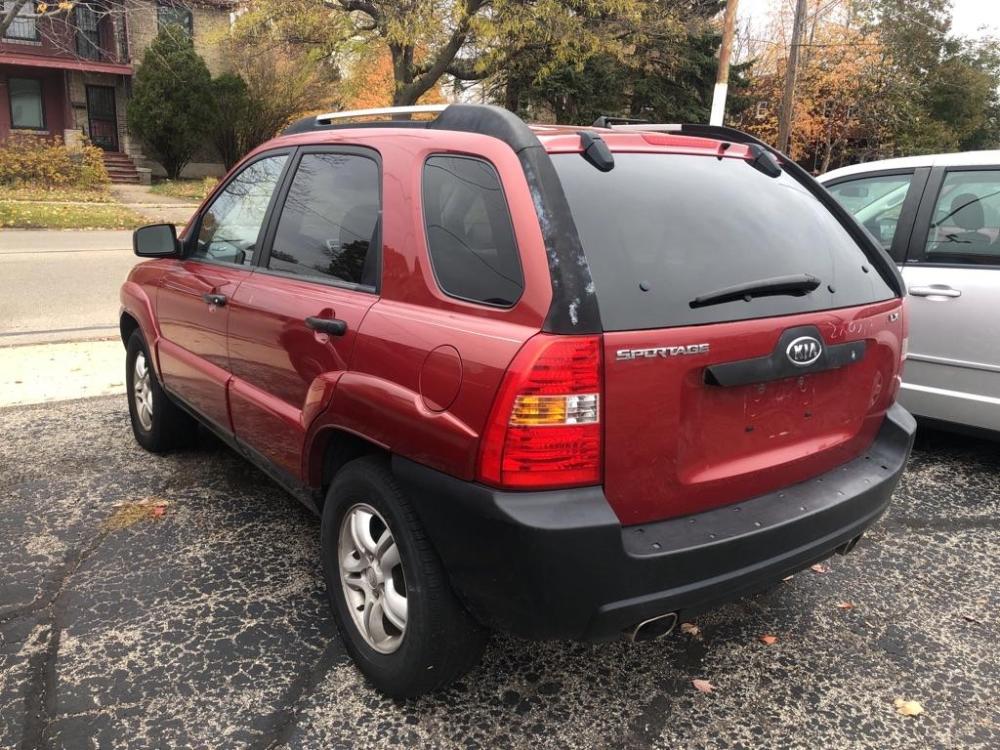 2005 RED KIA NEW SPORTAGE (KNDJE723257) with an 2.7L engine, Automatic transmission, located at 151 Alpine Road, Rockford, IL, 61108, (815) 398-5010, 42.212986, -89.029320 - Photo #3