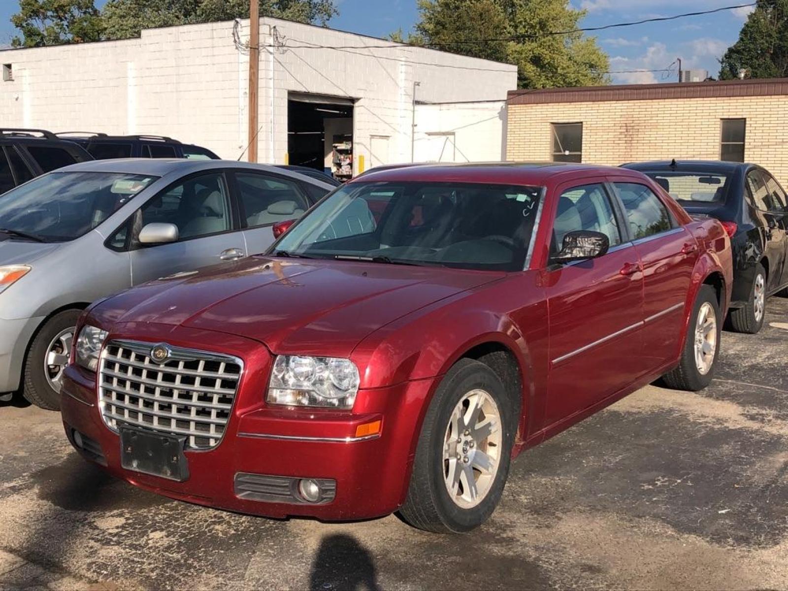 2007 RED CHRYSLER 300 TOURING (2C3KA53GX7H) with an 3.5L engine, Automatic transmission, located at 1708 Broadway, Rockford, IL, 61104, (815) 397-5010, 42.252522, -89.069359 - Photo #0