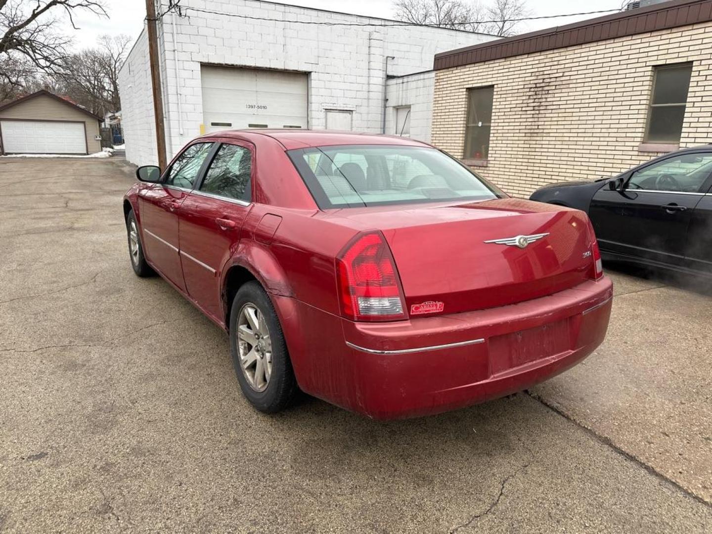 2007 RED CHRYSLER 300 TOURING (2C3KA53GX7H) with an 3.5L engine, Automatic transmission, located at 1708 Broadway, Rockford, IL, 61104, (815) 397-5010, 42.252522, -89.069359 - Photo#1