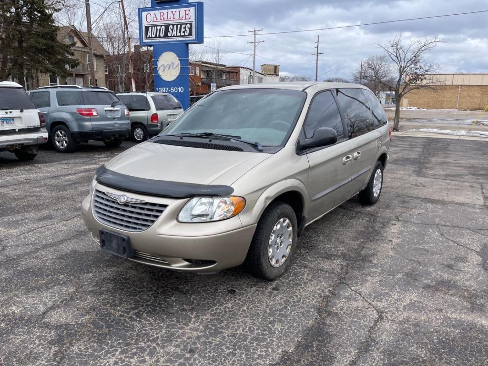 2002 GOLD CHRYSLER VOYAGER LX (1C4GJ45372B) with an 3.3L engine, Automatic transmission, located at 1708 Broadway, Rockford, IL, 61104, (815) 397-5010, 42.252522, -89.069359 - Photo #0