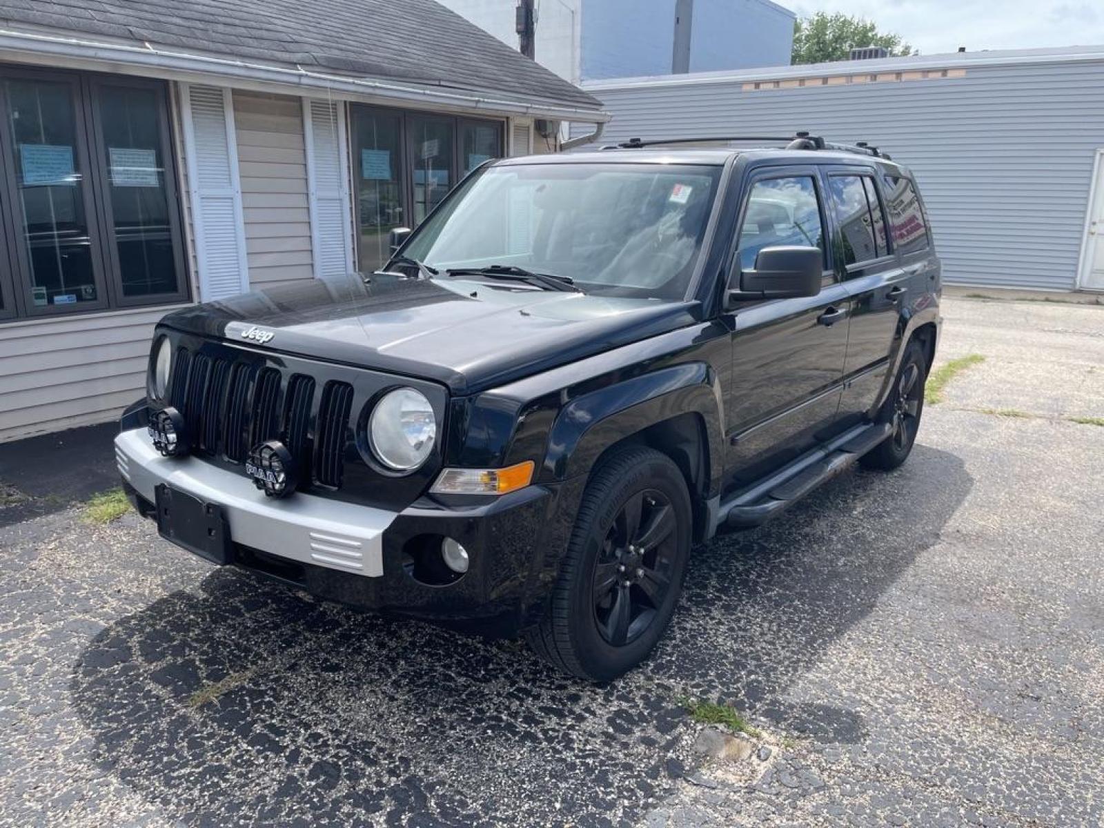 2007 BLACK JEEP PATRIOT LIMITED (1J8FF48W27D) with an 2.4L engine, Continuously Variable transmission, located at 1708 Broadway, Rockford, IL, 61104, (815) 397-5010, 42.252522, -89.069359 - Photo #0