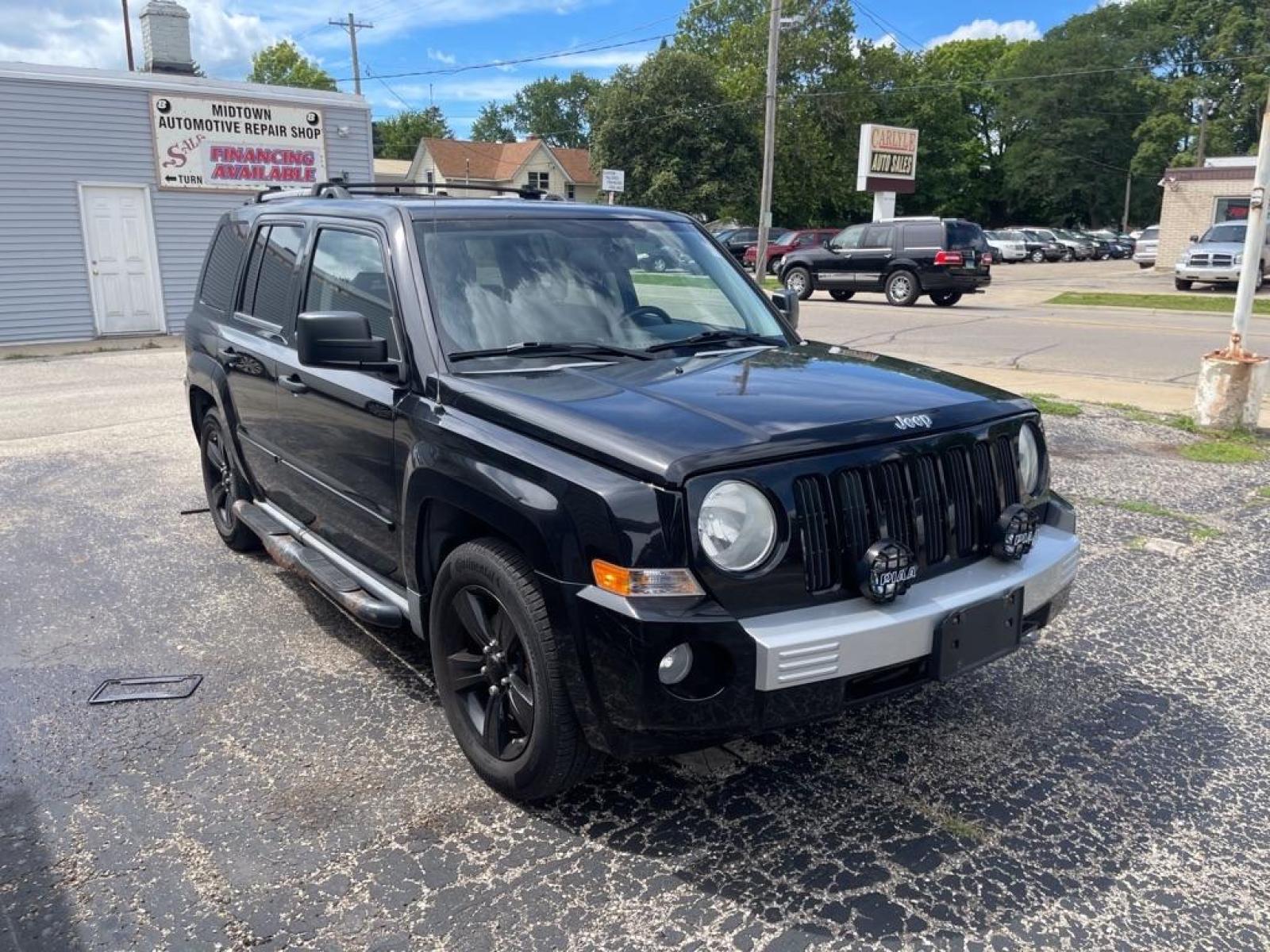 2007 BLACK JEEP PATRIOT LIMITED (1J8FF48W27D) with an 2.4L engine, Continuously Variable transmission, located at 1708 Broadway, Rockford, IL, 61104, (815) 397-5010, 42.252522, -89.069359 - Photo #1