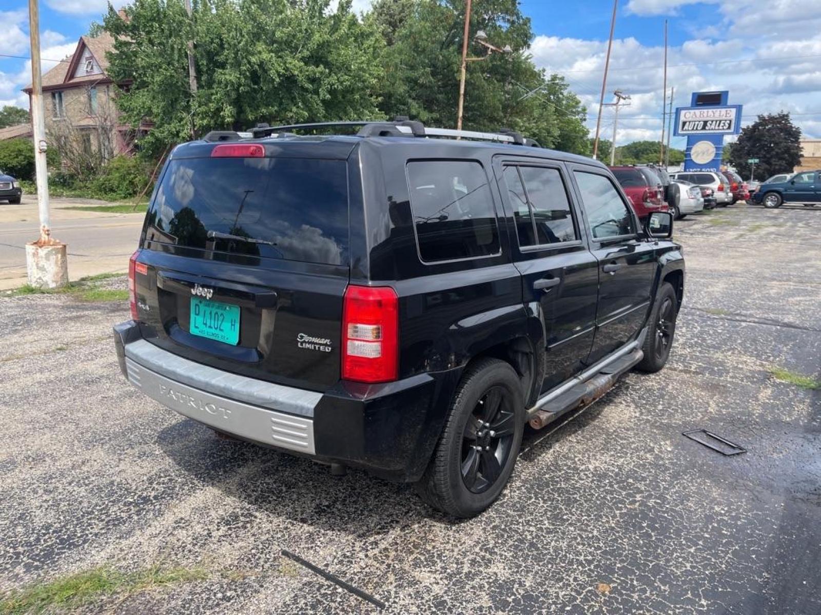 2007 BLACK JEEP PATRIOT LIMITED (1J8FF48W27D) with an 2.4L engine, Continuously Variable transmission, located at 1708 Broadway, Rockford, IL, 61104, (815) 397-5010, 42.252522, -89.069359 - Photo #2