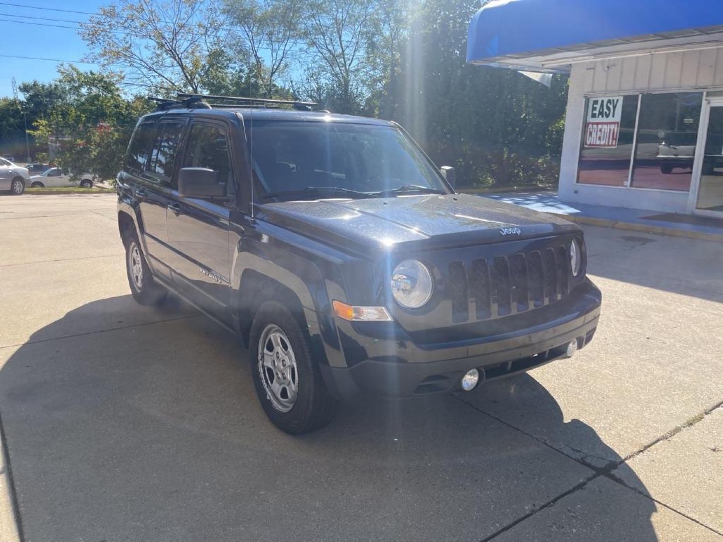 2014 BLACK JEEP PATRIOT SPORT (1C4NJRBB4ED) with an 2.4L engine, Continuously Variable transmission, located at 1708 Broadway, Rockford, IL, 61104, (815) 397-5010, 42.252522, -89.069359 - Photo#1