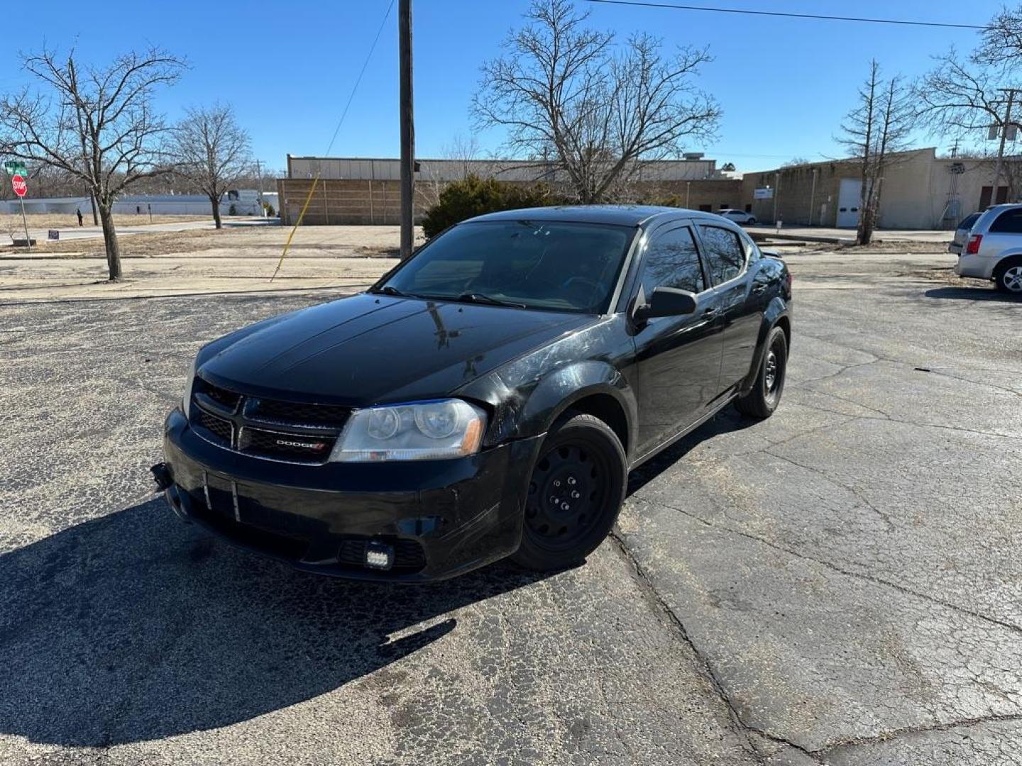 2013 BLACK DODGE AVENGER SE (1C3CDZAB0DN) with an 2.4L engine, Automatic transmission, located at 1708 Broadway, Rockford, IL, 61104, (815) 397-5010, 42.252522, -89.069359 - Photo#0