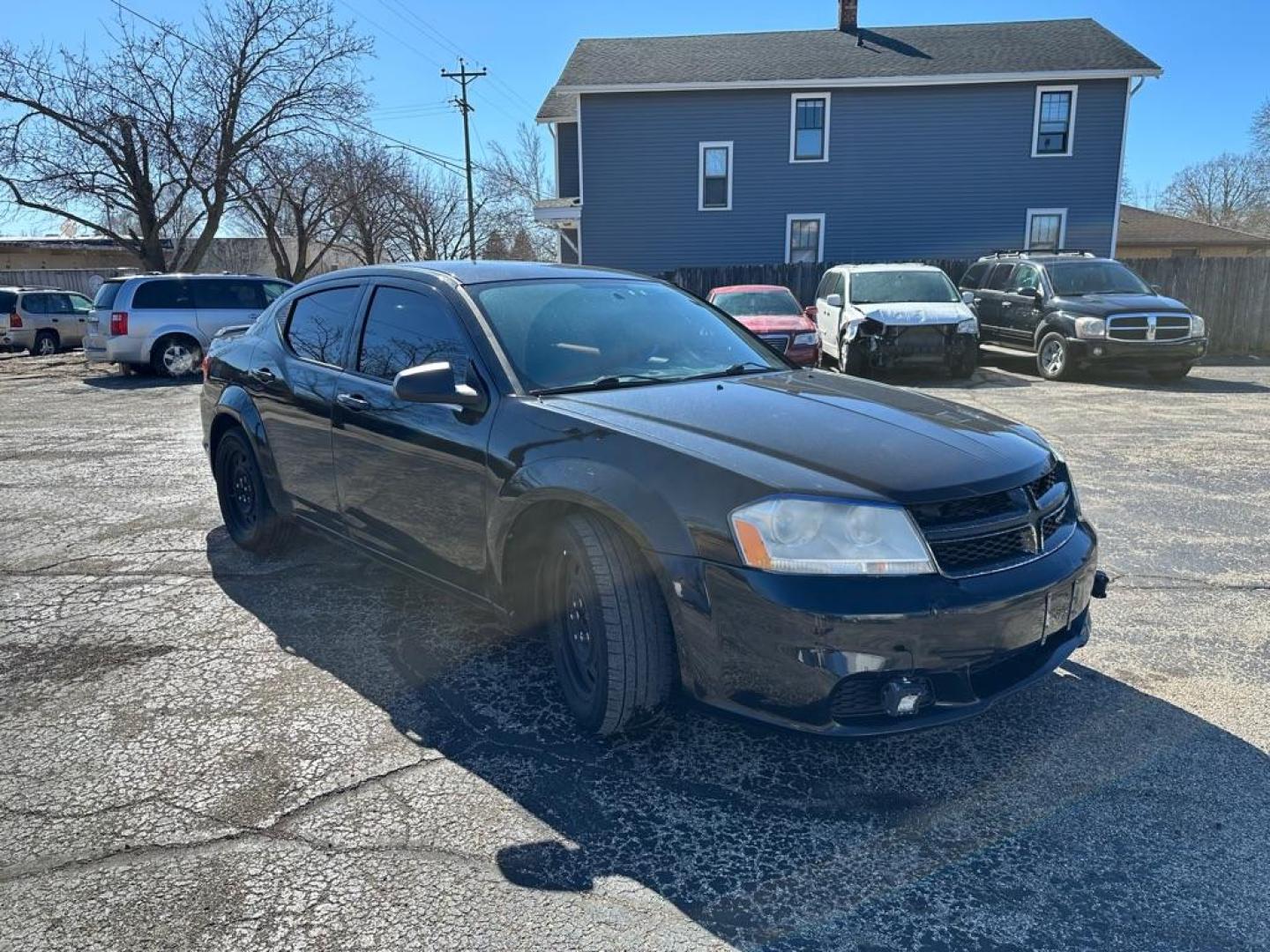 2013 BLACK DODGE AVENGER SE (1C3CDZAB0DN) with an 2.4L engine, Automatic transmission, located at 1708 Broadway, Rockford, IL, 61104, (815) 397-5010, 42.252522, -89.069359 - Photo#1