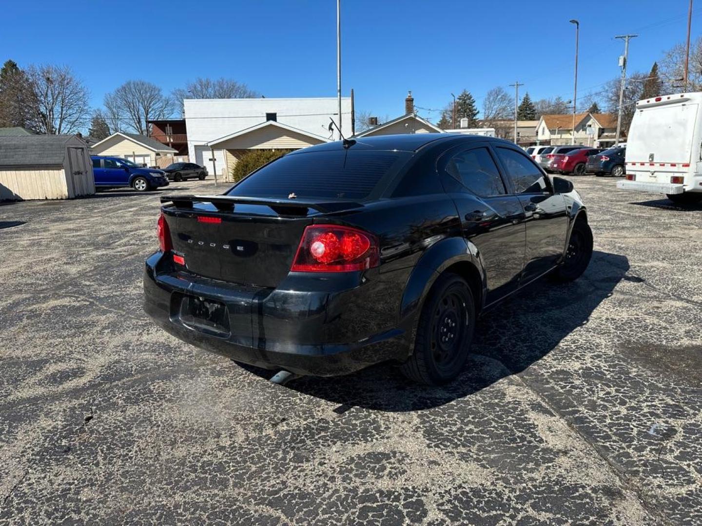 2013 BLACK DODGE AVENGER SE (1C3CDZAB0DN) with an 2.4L engine, Automatic transmission, located at 1708 Broadway, Rockford, IL, 61104, (815) 397-5010, 42.252522, -89.069359 - Photo#2