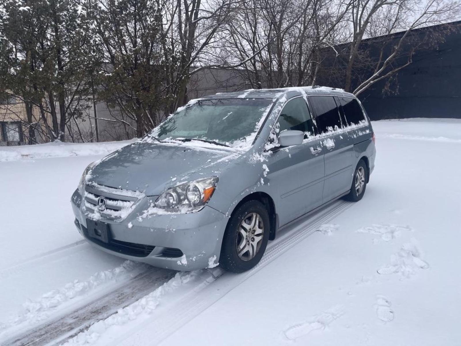 2007 BLUE HONDA ODYSSEY EX (5FNRL38407B) with an 3.5L engine, Automatic transmission, located at 1708 Broadway, Rockford, IL, 61104, (815) 397-5010, 42.252522, -89.069359 - Photo #0