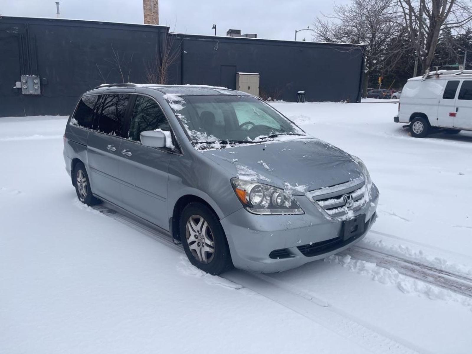 2007 BLUE HONDA ODYSSEY EX (5FNRL38407B) with an 3.5L engine, Automatic transmission, located at 1708 Broadway, Rockford, IL, 61104, (815) 397-5010, 42.252522, -89.069359 - Photo #1