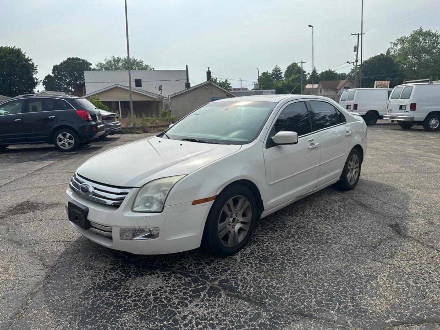 2008 WHITE FORD FUSION SEL (3FAHP08148R) with an 3.0L engine, Automatic transmission, located at 1708 Broadway, Rockford, IL, 61104, (815) 397-5010, 42.252522, -89.069359 - Photo#0