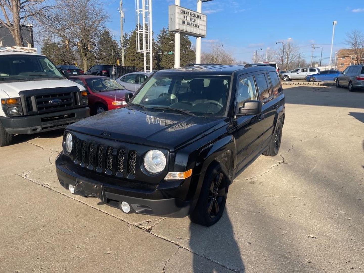 2014 BLACK JEEP PATRIOT SPORT (1C4NJPBAXED) with an 2.0L engine, Continuously Variable transmission, located at 1708 Broadway, Rockford, IL, 61104, (815) 397-5010, 42.252522, -89.069359 - Photo#0