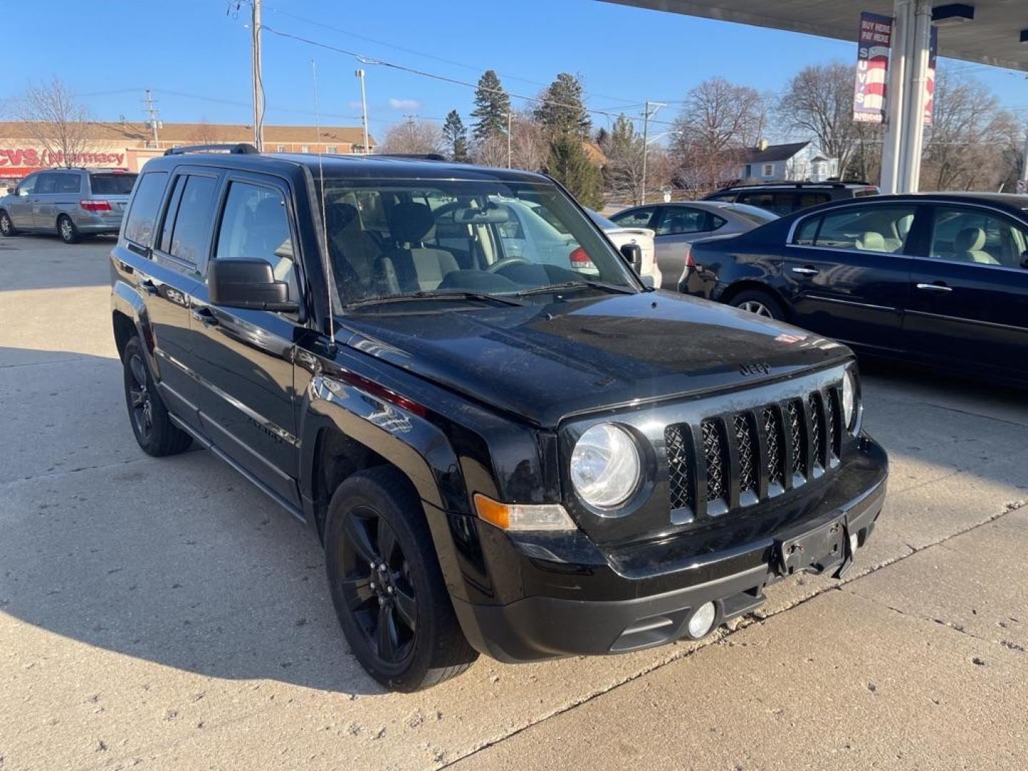 2014 BLACK JEEP PATRIOT SPORT (1C4NJPBAXED) with an 2.0L engine, Continuously Variable transmission, located at 1708 Broadway, Rockford, IL, 61104, (815) 397-5010, 42.252522, -89.069359 - Photo#1