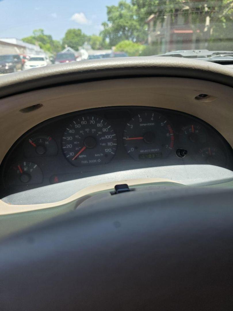 2003 WHITE FORD MUSTANG CONVERTABLE (1FAFP44493F) with an 3.8L engine, Automatic transmission, located at 1708 Broadway, Rockford, IL, 61104, (815) 397-5010, 42.252522, -89.069359 - Photo#3