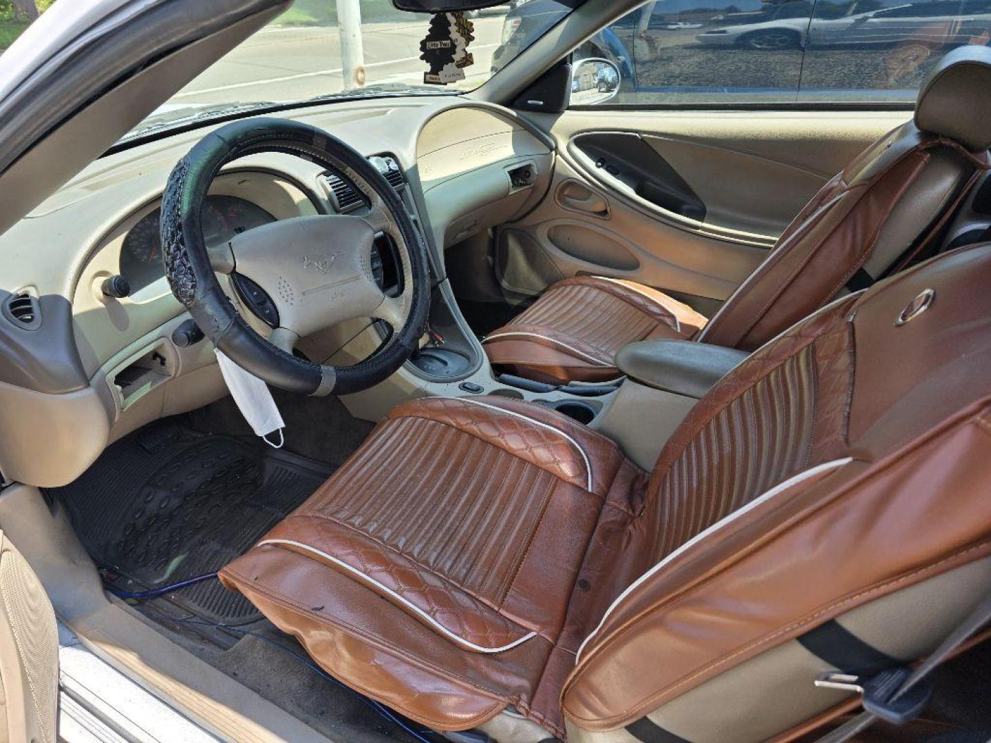 2003 WHITE FORD MUSTANG CONVERTABLE (1FAFP44493F) with an 3.8L engine, Automatic transmission, located at 1708 Broadway, Rockford, IL, 61104, (815) 397-5010, 42.252522, -89.069359 - Photo#6
