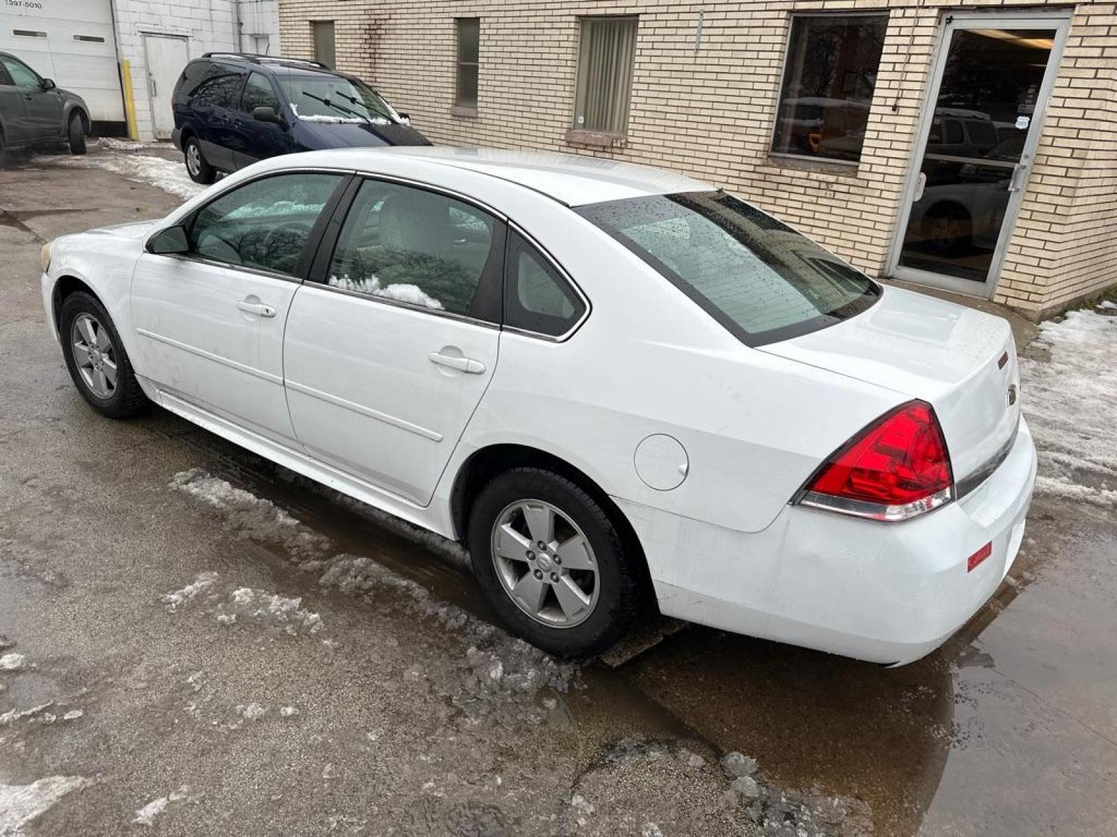 2010 WHITE CHEVROLET IMPALA LT (2G1WB5EKXA1) with an 3.5L engine, Automatic transmission, located at 1708 Broadway, Rockford, IL, 61104, (815) 397-5010, 42.252522, -89.069359 - Photo #2
