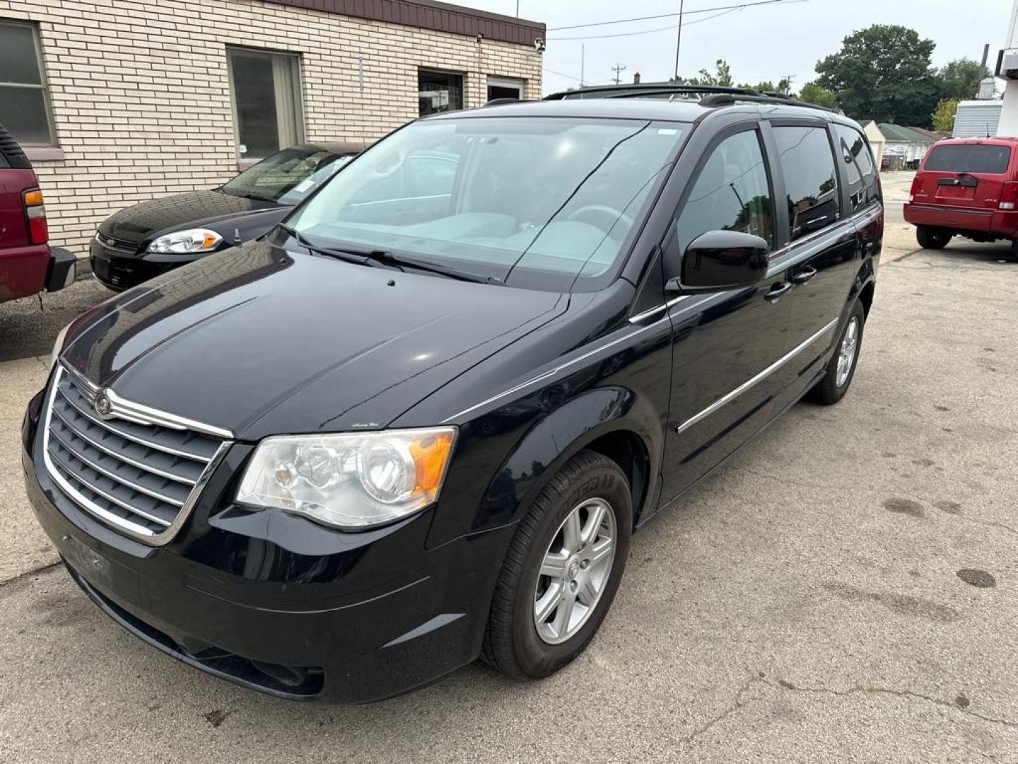 2010 BLACK CHRYSLER TOWN and COUNTRY TOURING (2A4RR5DX7AR) with an 4.0L engine, Automatic transmission, located at 1708 Broadway, Rockford, IL, 61104, (815) 397-5010, 42.252522, -89.069359 - Photo#0