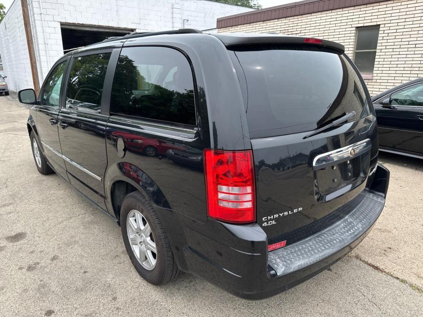 2010 BLACK CHRYSLER TOWN and COUNTRY TOURING (2A4RR5DX7AR) with an 4.0L engine, Automatic transmission, located at 1708 Broadway, Rockford, IL, 61104, (815) 397-5010, 42.252522, -89.069359 - Photo#1