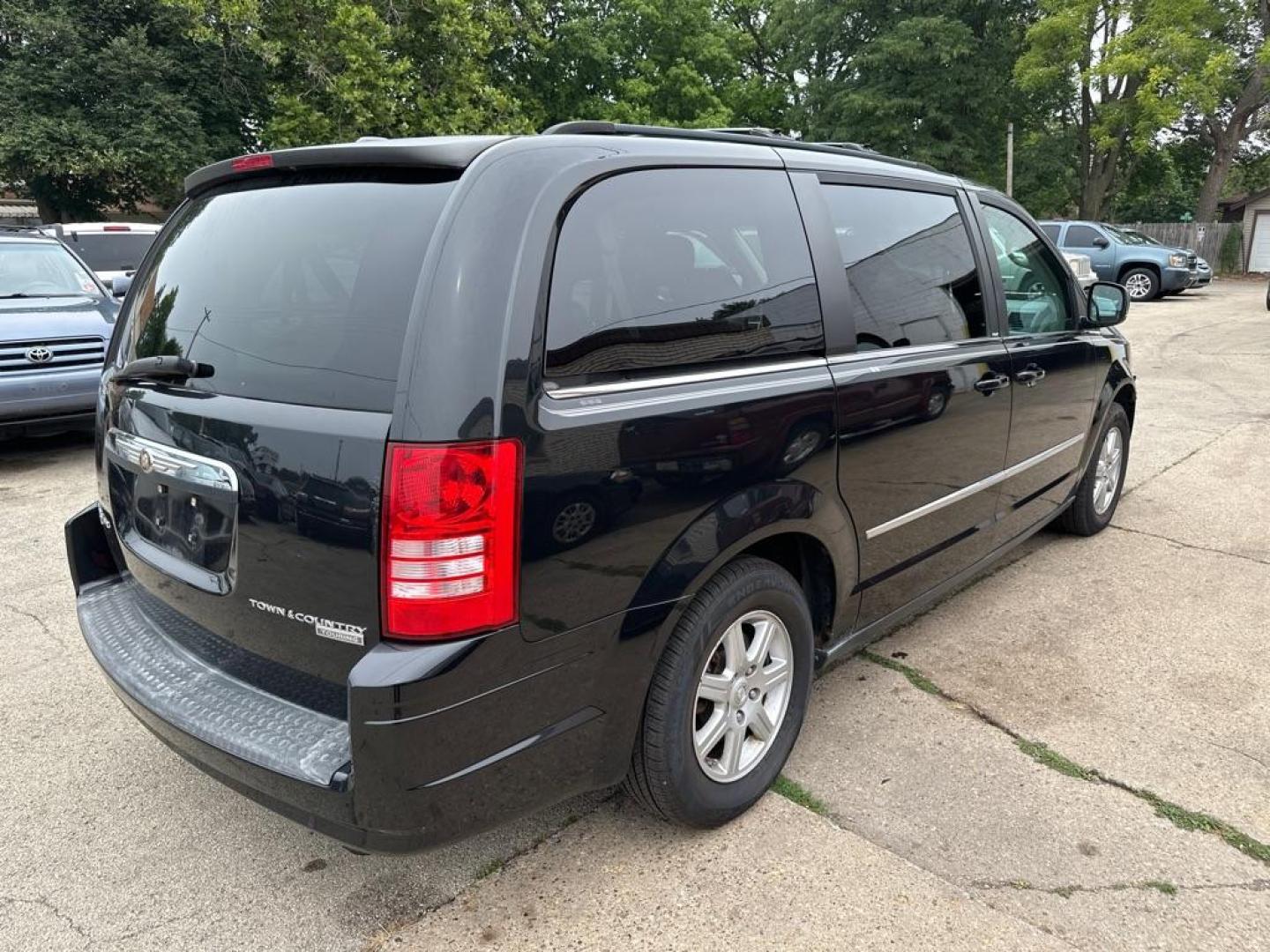 2010 BLACK CHRYSLER TOWN and COUNTRY TOURING (2A4RR5DX7AR) with an 4.0L engine, Automatic transmission, located at 1708 Broadway, Rockford, IL, 61104, (815) 397-5010, 42.252522, -89.069359 - Photo#2