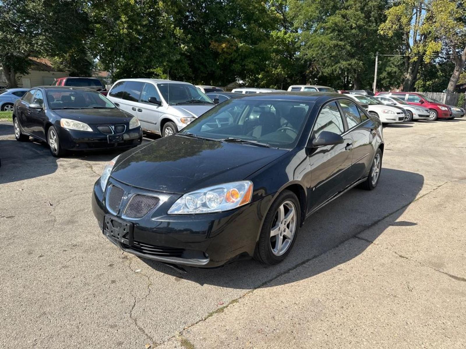 2007 BLACK PONTIAC G6 BASE (1G2ZG58N874) with an 3.5L engine, Automatic transmission, located at 1708 Broadway, Rockford, IL, 61104, (815) 397-5010, 42.252522, -89.069359 - Photo #0