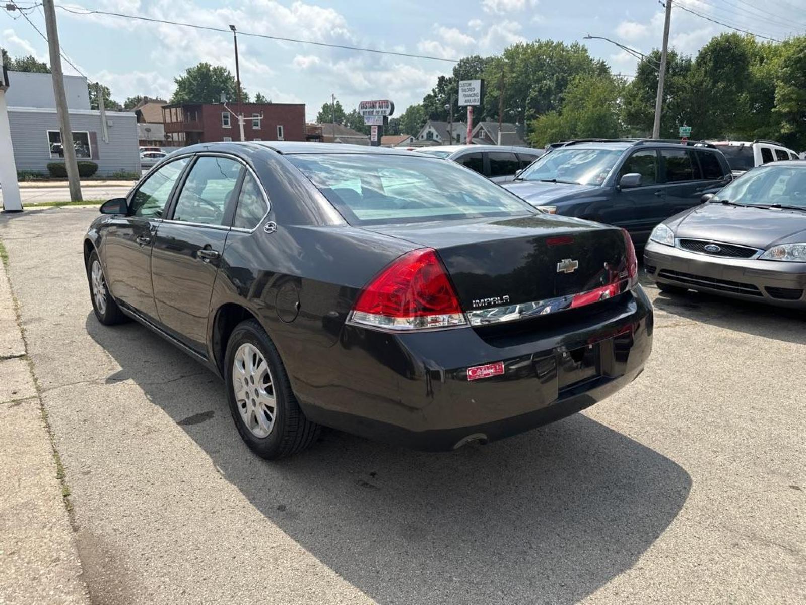 2008 BLACK CHEVROLET IMPALA POLICE (2G1WS583481) with an 3.9L engine, Automatic transmission, located at 1708 Broadway, Rockford, IL, 61104, (815) 397-5010, 42.252522, -89.069359 - Photo #1