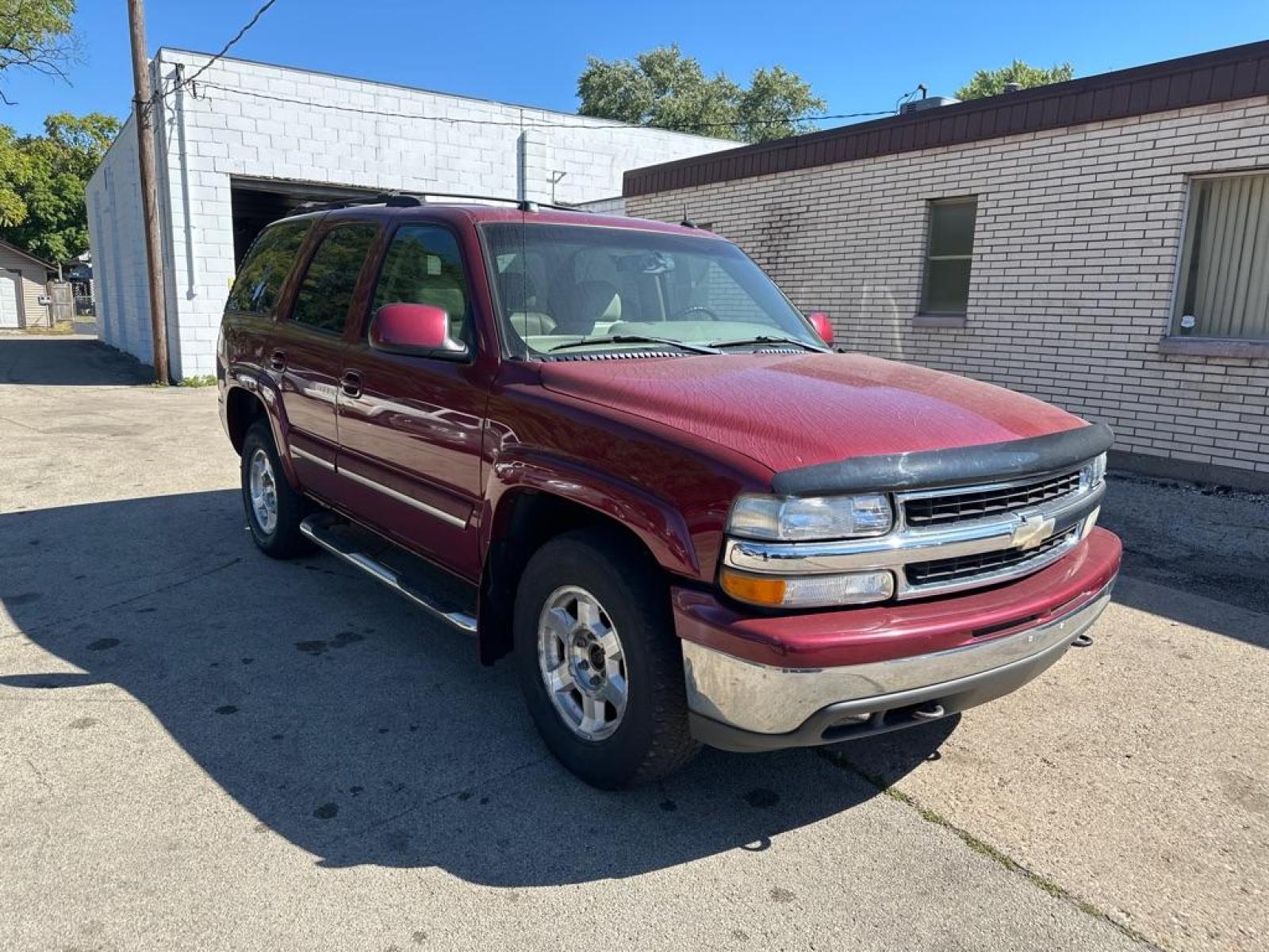 2005 RED CHEVROLET TAHOE 1500 (1GNEK13T25J) with an 5.3L engine, Automatic transmission, located at 1708 Broadway, Rockford, IL, 61104, (815) 397-5010, 42.252522, -89.069359 - Photo #3