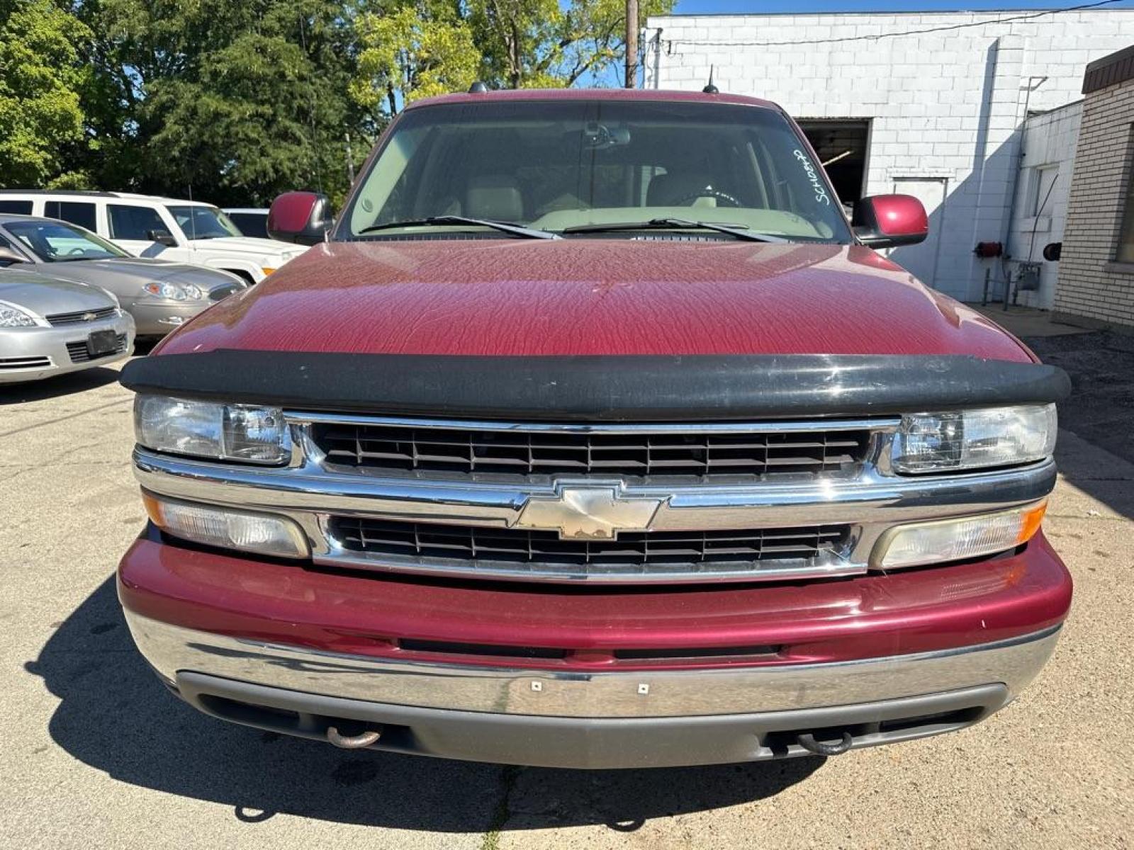 2005 RED CHEVROLET TAHOE 1500 (1GNEK13T25J) with an 5.3L engine, Automatic transmission, located at 1708 Broadway, Rockford, IL, 61104, (815) 397-5010, 42.252522, -89.069359 - Photo #4
