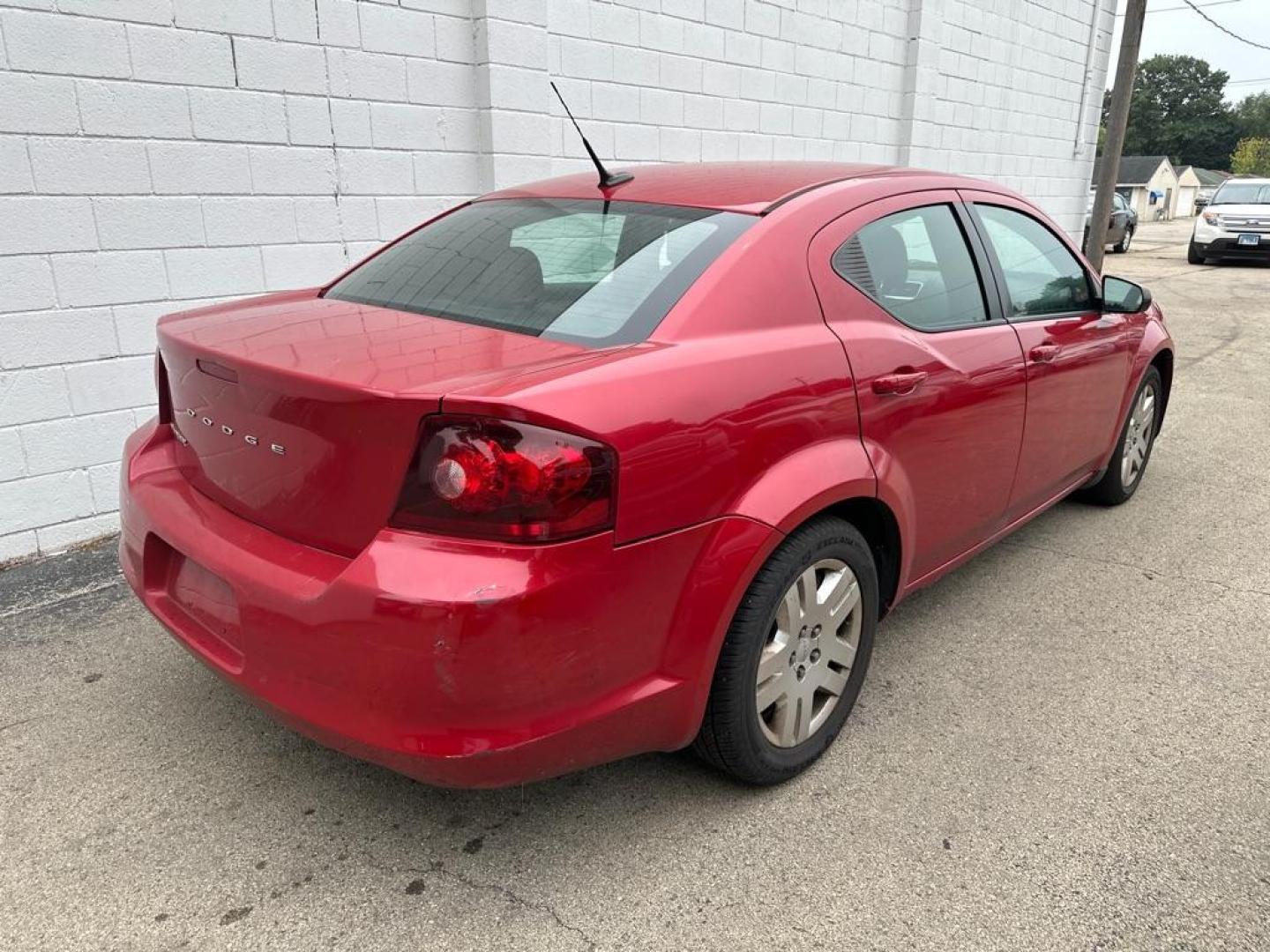 2011 RED DODGE AVENGER EXPRESS (1B3BD4FB7BN) with an 2.4L engine, Automatic transmission, located at 1708 Broadway, Rockford, IL, 61104, (815) 397-5010, 42.252522, -89.069359 - Photo#2