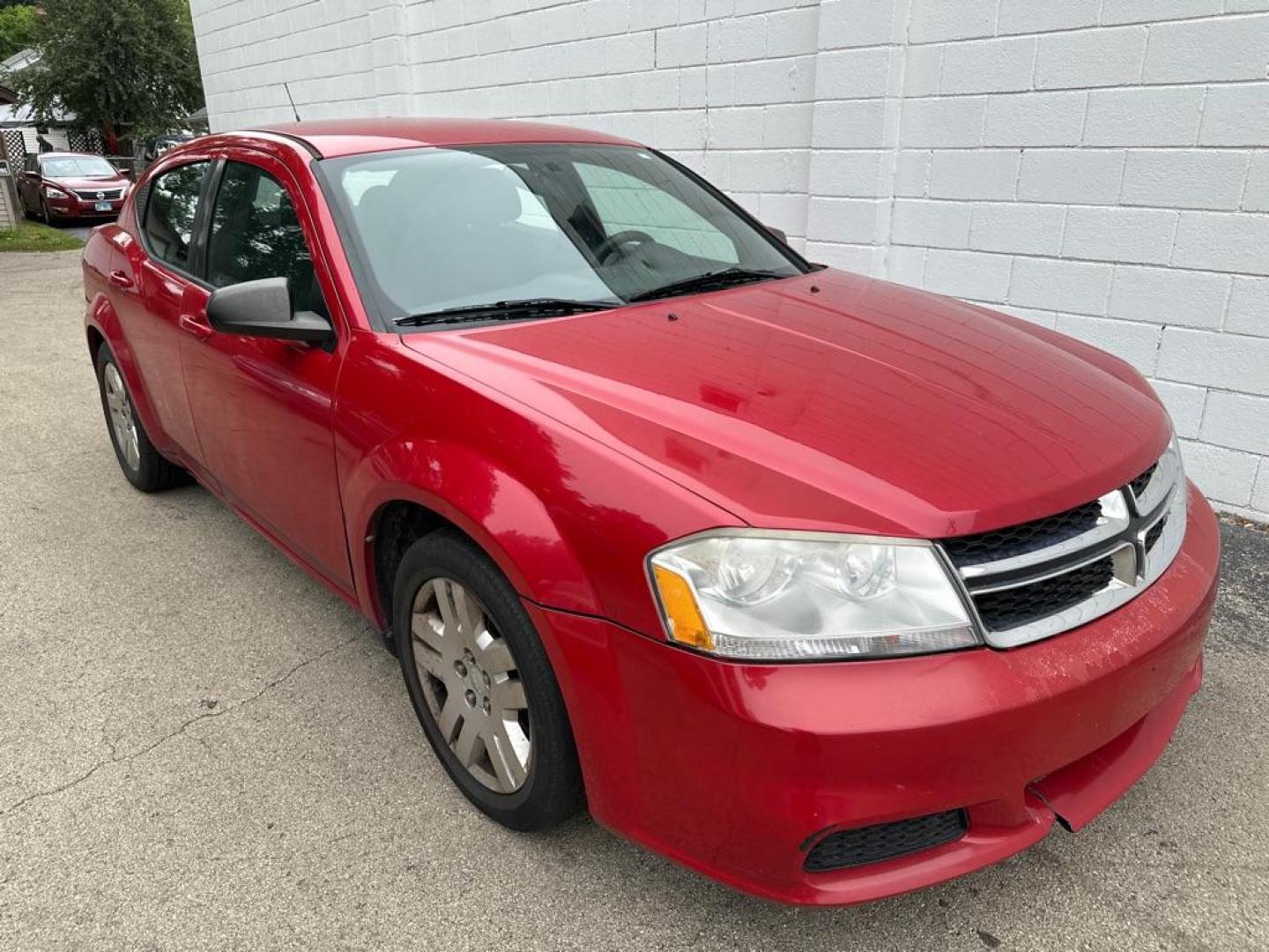 2011 RED DODGE AVENGER EXPRESS (1B3BD4FB7BN) with an 2.4L engine, Automatic transmission, located at 1708 Broadway, Rockford, IL, 61104, (815) 397-5010, 42.252522, -89.069359 - Photo#3