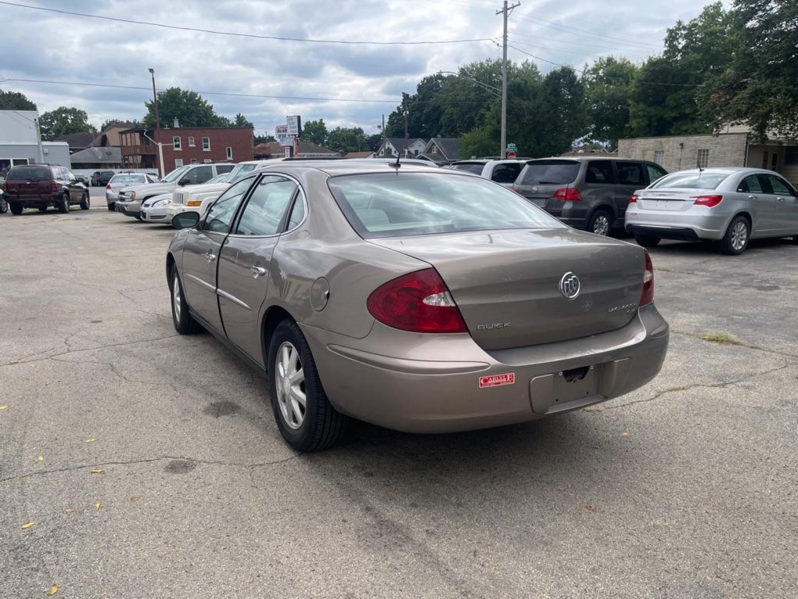 2006 TAN BUICK LACROSSE CX (2G4WC582661) with an 3.8L engine, Automatic transmission, located at 1708 Broadway, Rockford, IL, 61104, (815) 397-5010, 42.252522, -89.069359 - Photo #3
