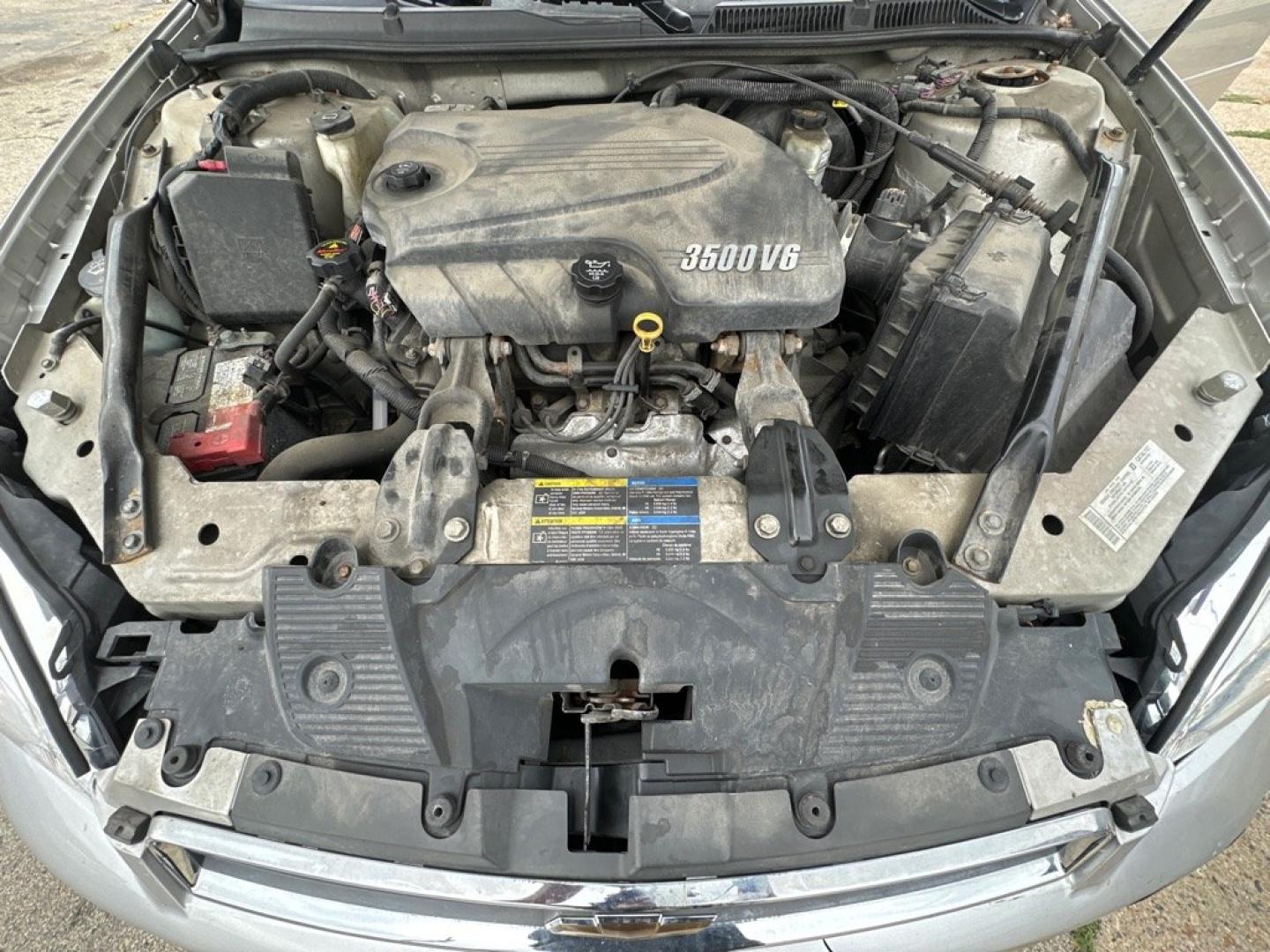 2007 SILVER CHEVROLET IMPALA LT (2G1WT58K179) with an 3.5L engine, Automatic transmission, located at 1708 Broadway, Rockford, IL, 61104, (815) 397-5010, 42.252522, -89.069359- Photo#9