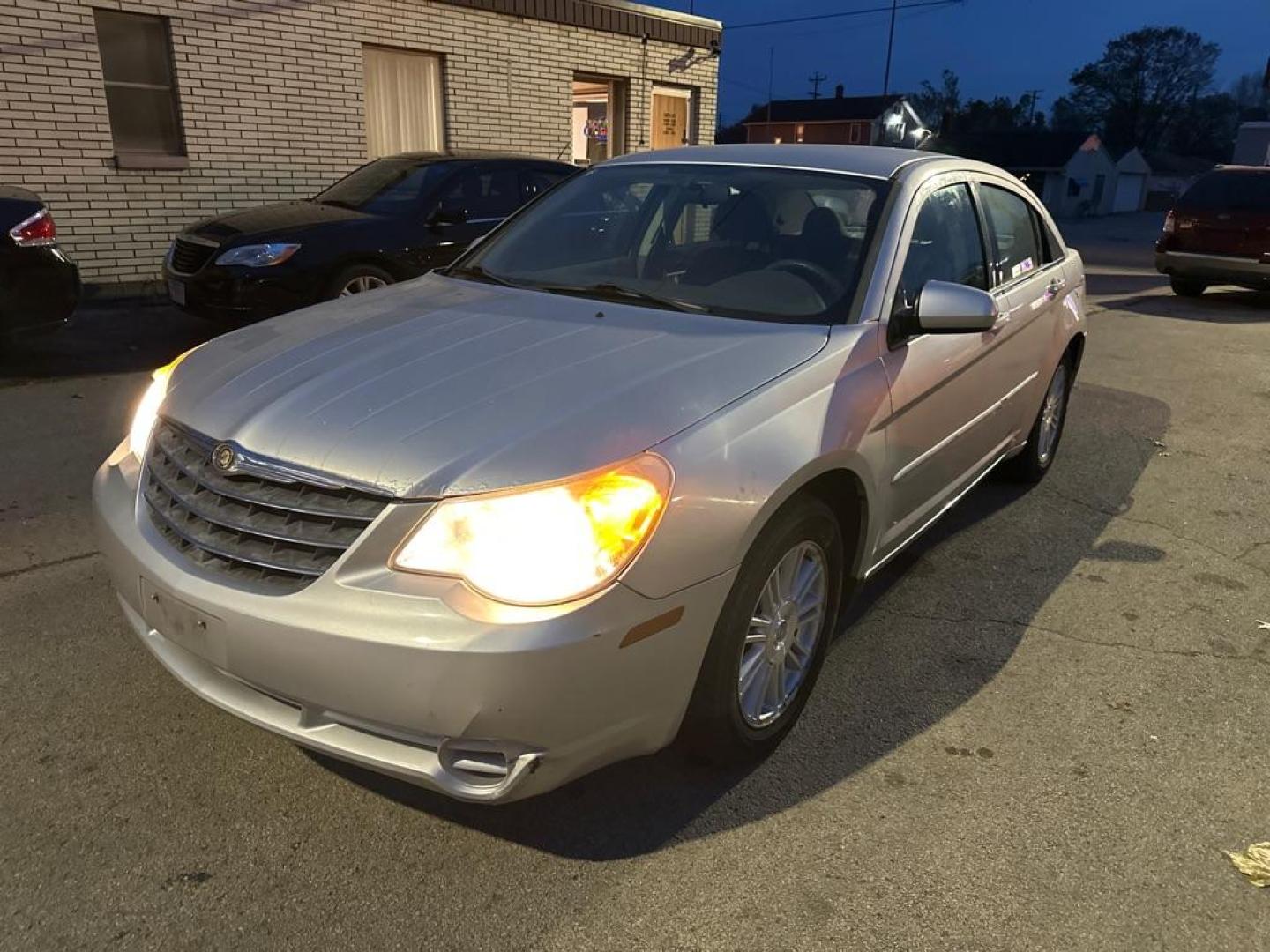 2007 SILVER CHRYSLER SEBRING TOURING (1C3LC56K87N) with an 2.4L engine, Automatic transmission, located at 1708 Broadway, Rockford, IL, 61104, (815) 397-5010, 42.252522, -89.069359 - Photo#0