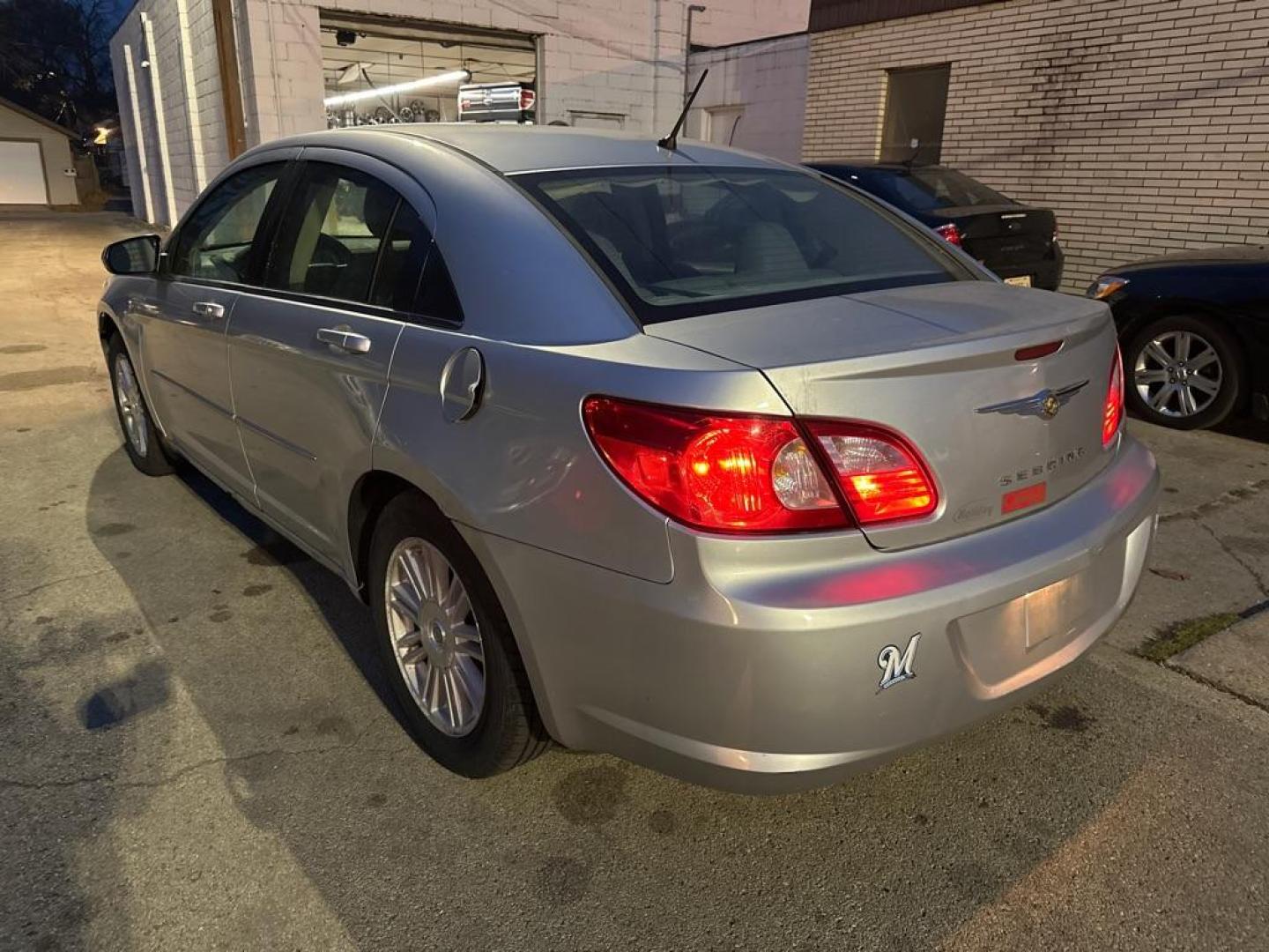 2007 SILVER CHRYSLER SEBRING TOURING (1C3LC56K87N) with an 2.4L engine, Automatic transmission, located at 1708 Broadway, Rockford, IL, 61104, (815) 397-5010, 42.252522, -89.069359 - Photo#1