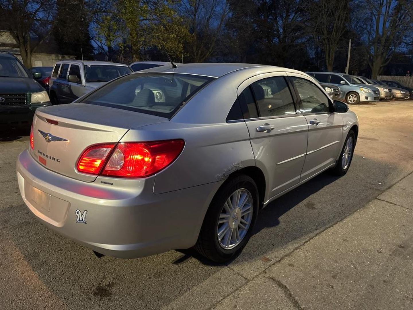 2007 SILVER CHRYSLER SEBRING TOURING (1C3LC56K87N) with an 2.4L engine, Automatic transmission, located at 1708 Broadway, Rockford, IL, 61104, (815) 397-5010, 42.252522, -89.069359 - Photo#2