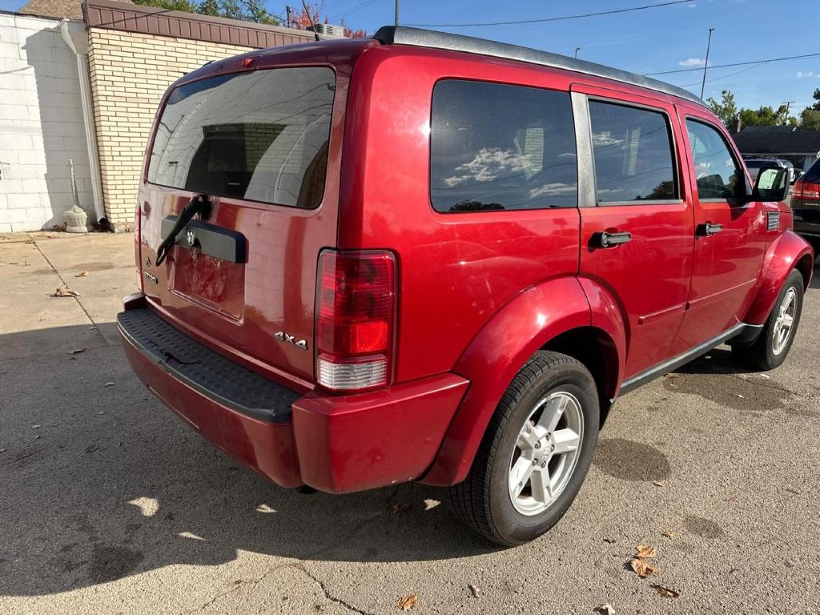 2007 RED DODGE NITRO SXT (1D8GU28K87W) with an 3.7L engine, Automatic transmission, located at 1708 Broadway, Rockford, IL, 61104, (815) 397-5010, 42.252522, -89.069359 - Photo #2