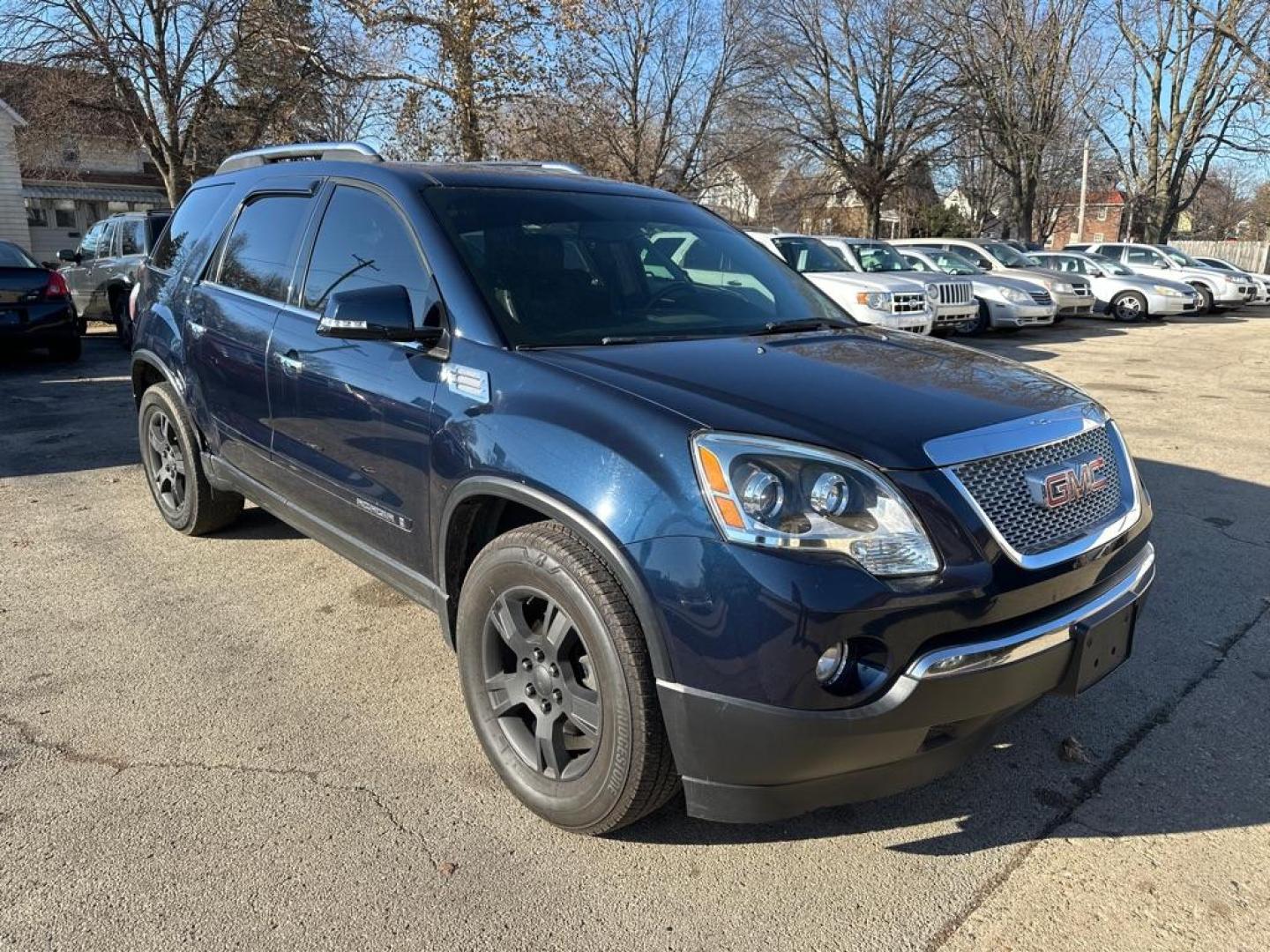 2007 BLUE GMC ACADIA SLT-1 (1GKER23707J) with an 3.6L engine, Automatic transmission, located at 1708 Broadway, Rockford, IL, 61104, (815) 397-5010, 42.252522, -89.069359 - Photo#3