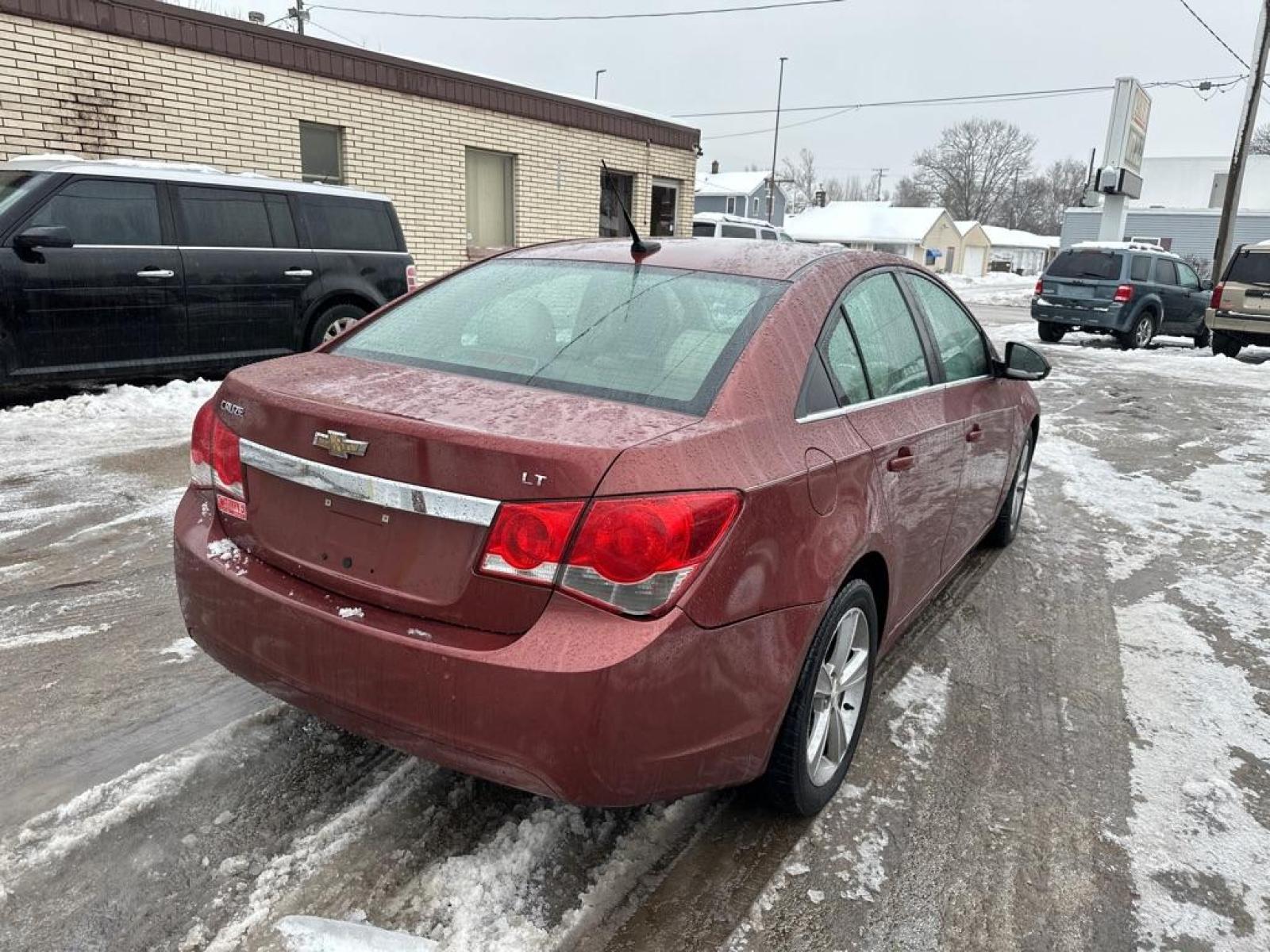 2013 BROWN CHEVROLET CRUZE LT (1G1PE5SB0D7) with an 1.4L engine, Automatic transmission, located at 1708 Broadway, Rockford, IL, 61104, (815) 397-5010, 42.252522, -89.069359 - Photo #2