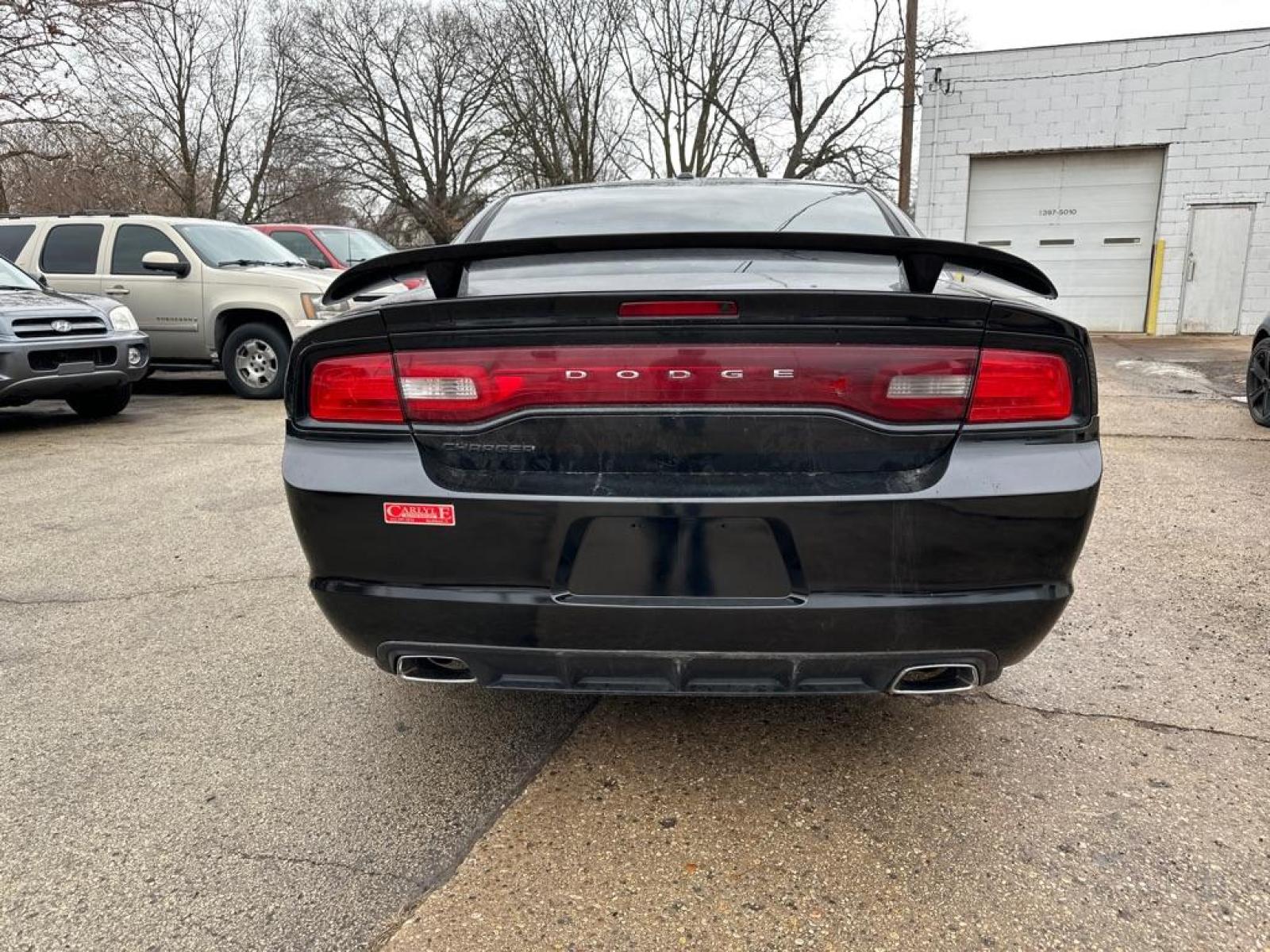 2012 BLACK DODGE CHARGER SE (2C3CDXBG5CH) with an 3.6L engine, Automatic transmission, located at 1708 Broadway, Rockford, IL, 61104, (815) 397-5010, 42.252522, -89.069359 - Photo #2