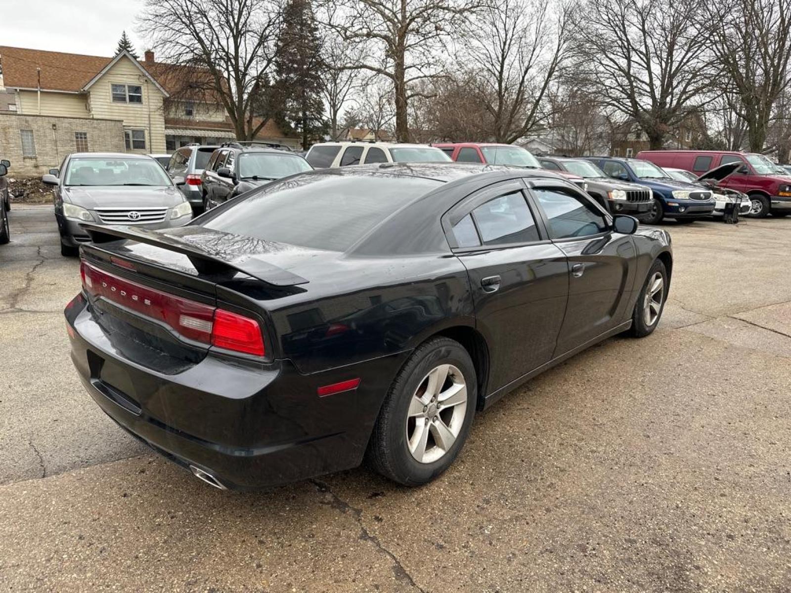 2012 BLACK DODGE CHARGER SE (2C3CDXBG5CH) with an 3.6L engine, Automatic transmission, located at 1708 Broadway, Rockford, IL, 61104, (815) 397-5010, 42.252522, -89.069359 - Photo #3