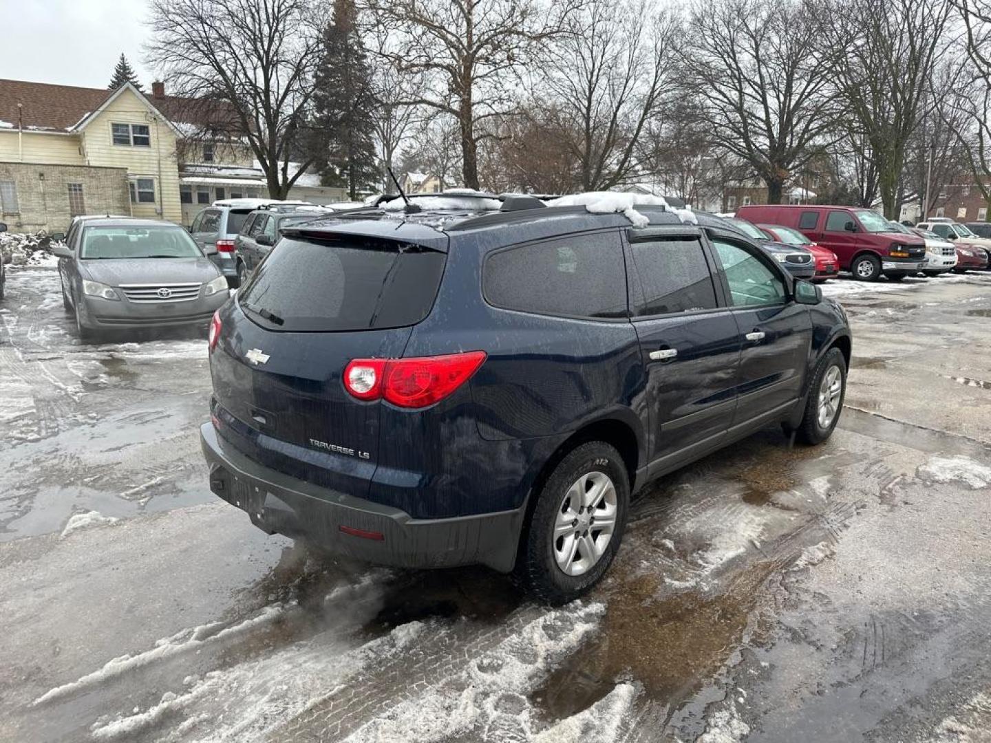2010 BLUE CHEVROLET TRAVERSE LS (1GNLREEDXAJ) with an 3.6L engine, Automatic transmission, located at 1708 Broadway, Rockford, IL, 61104, (815) 397-5010, 42.252522, -89.069359 - Photo#2