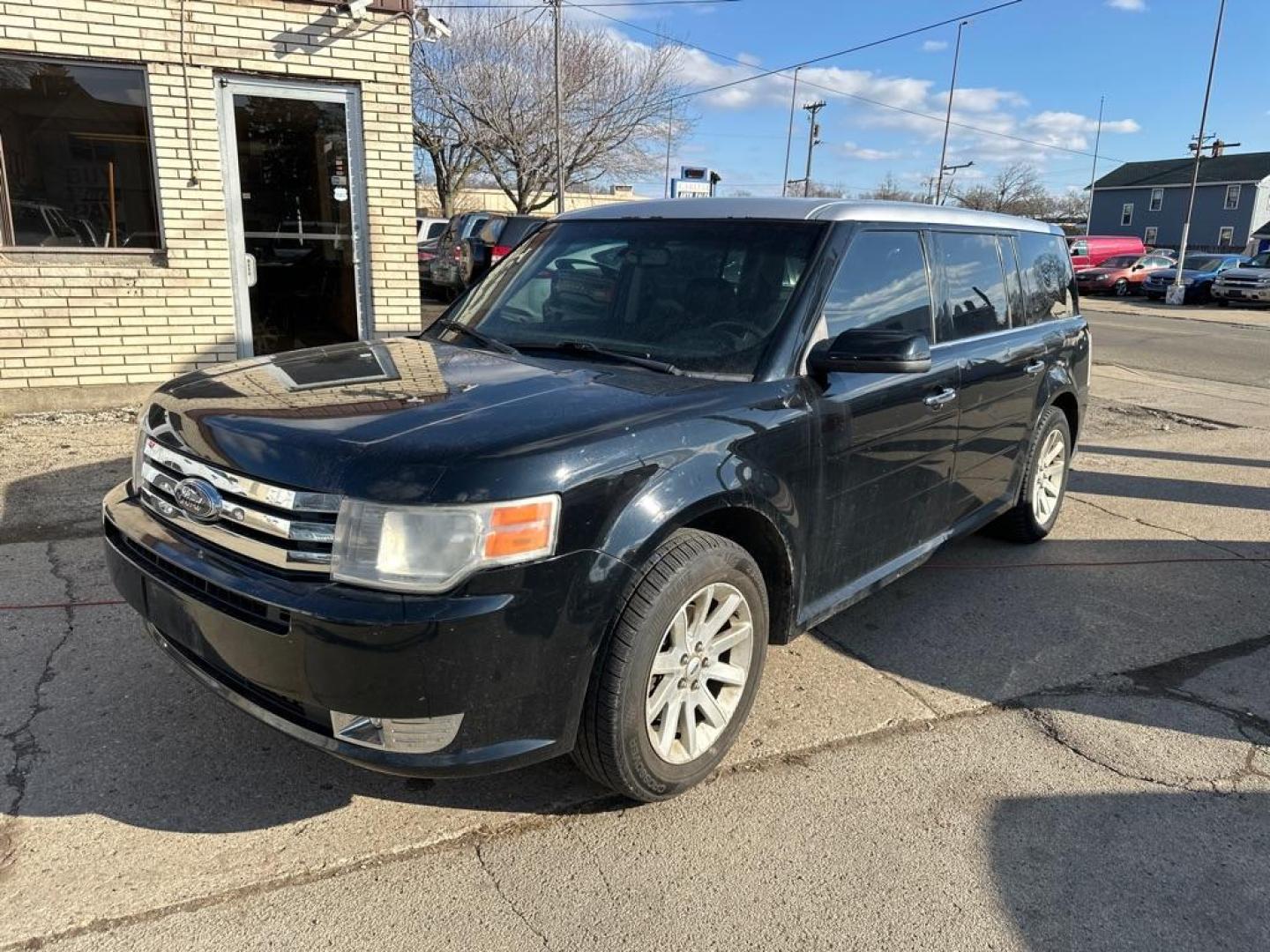 2009 BLACK FORD FLEX SEL (2FMDK52CX9B) with an 3.5L engine, Automatic transmission, located at 1708 Broadway, Rockford, IL, 61104, (815) 397-5010, 42.252522, -89.069359 - Photo#0