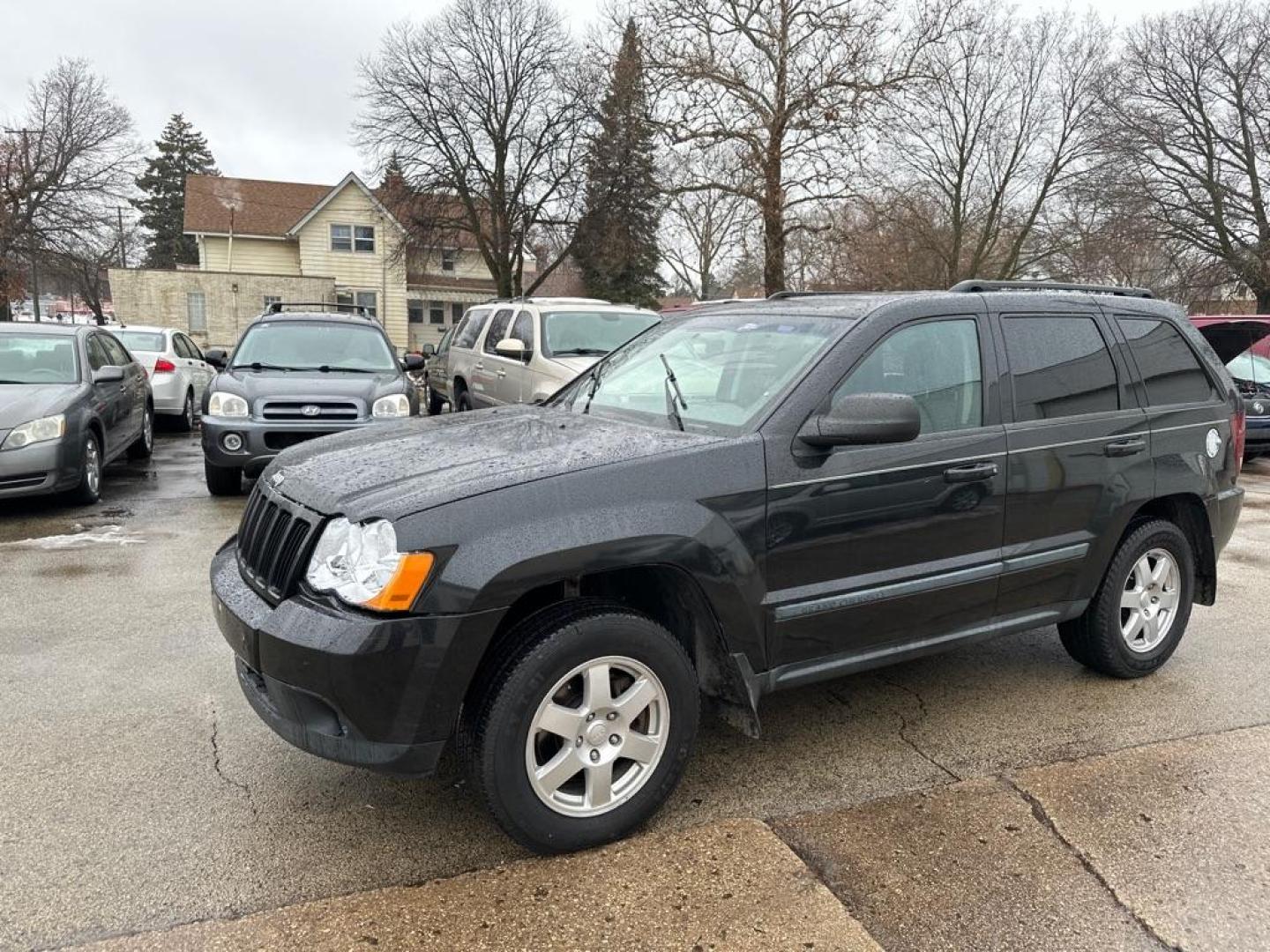 2009 BLACK JEEP GRAND CHEROKEE LAREDO (1J8GR48K79C) with an 3.7L engine, Automatic transmission, located at 1708 Broadway, Rockford, IL, 61104, (815) 397-5010, 42.252522, -89.069359 - Photo#0