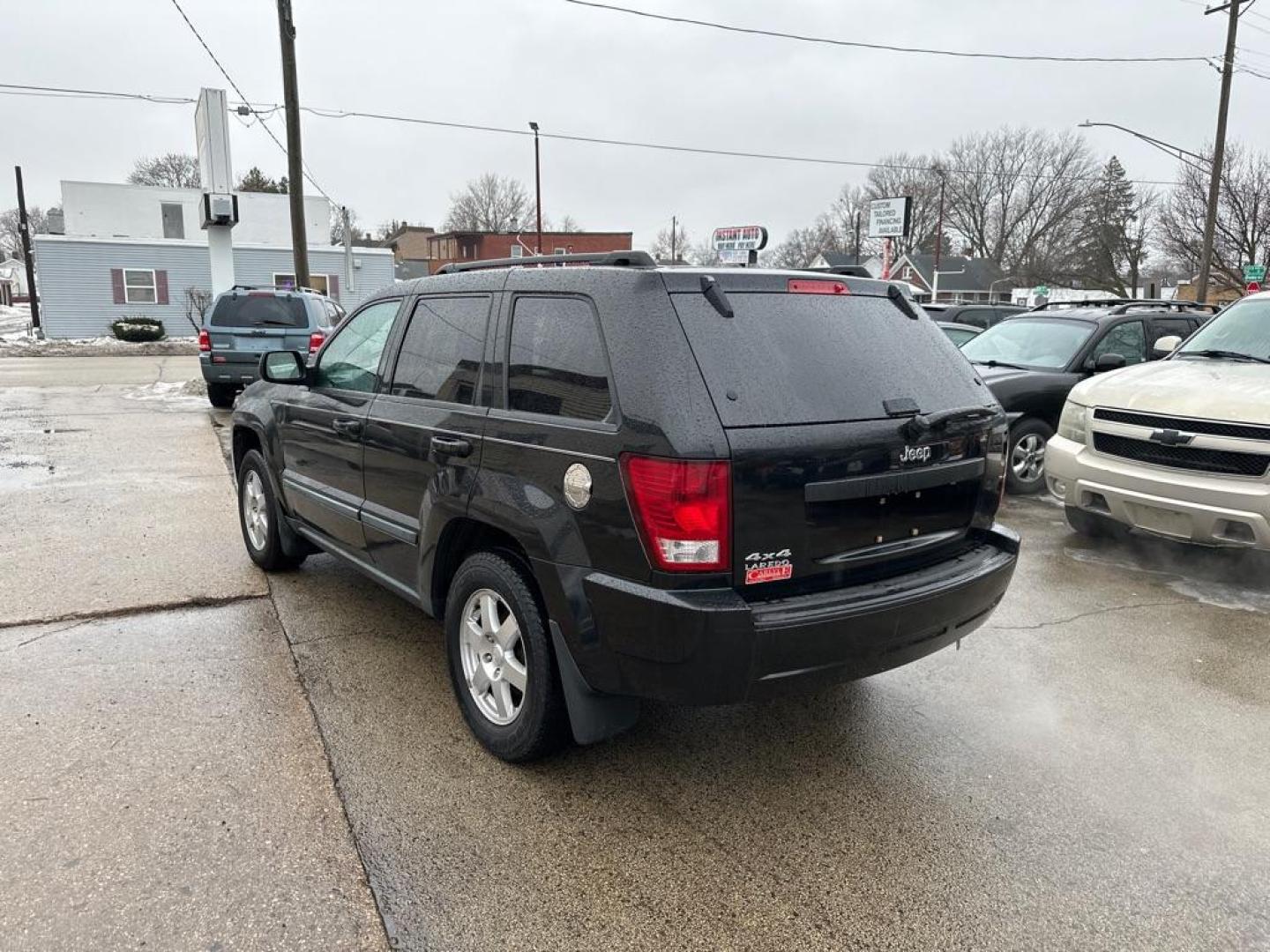 2009 BLACK JEEP GRAND CHEROKEE LAREDO (1J8GR48K79C) with an 3.7L engine, Automatic transmission, located at 1708 Broadway, Rockford, IL, 61104, (815) 397-5010, 42.252522, -89.069359 - Photo#1