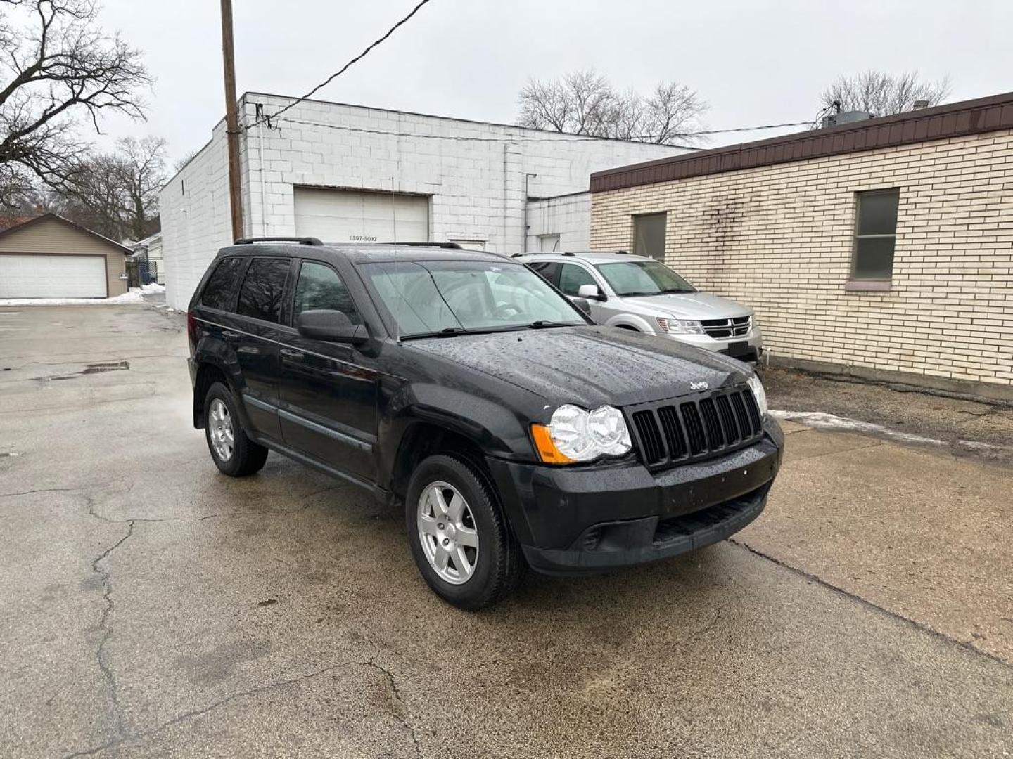2009 BLACK JEEP GRAND CHEROKEE LAREDO (1J8GR48K79C) with an 3.7L engine, Automatic transmission, located at 1708 Broadway, Rockford, IL, 61104, (815) 397-5010, 42.252522, -89.069359 - Photo#3